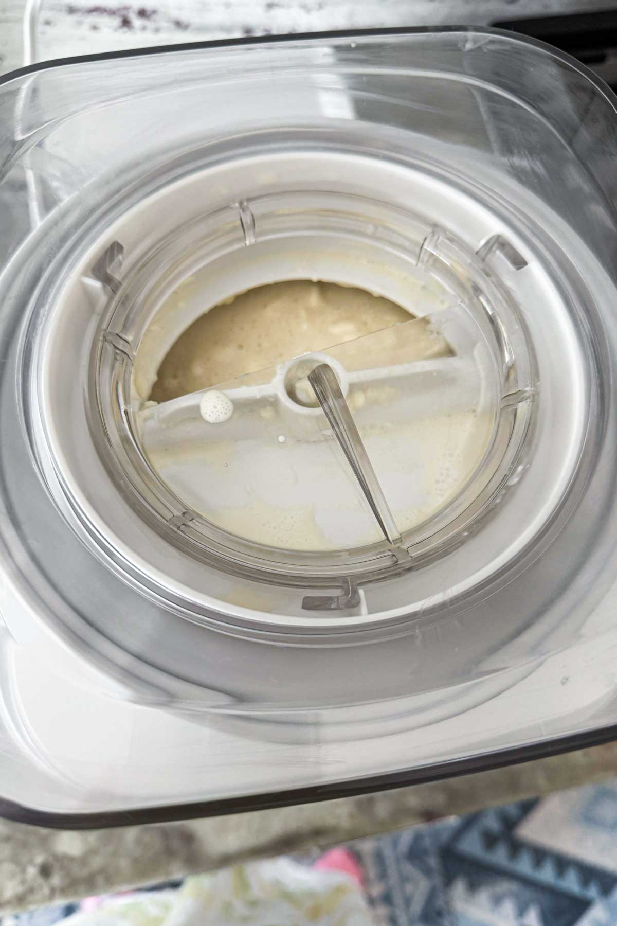 churning ice cream in an ice cream maker