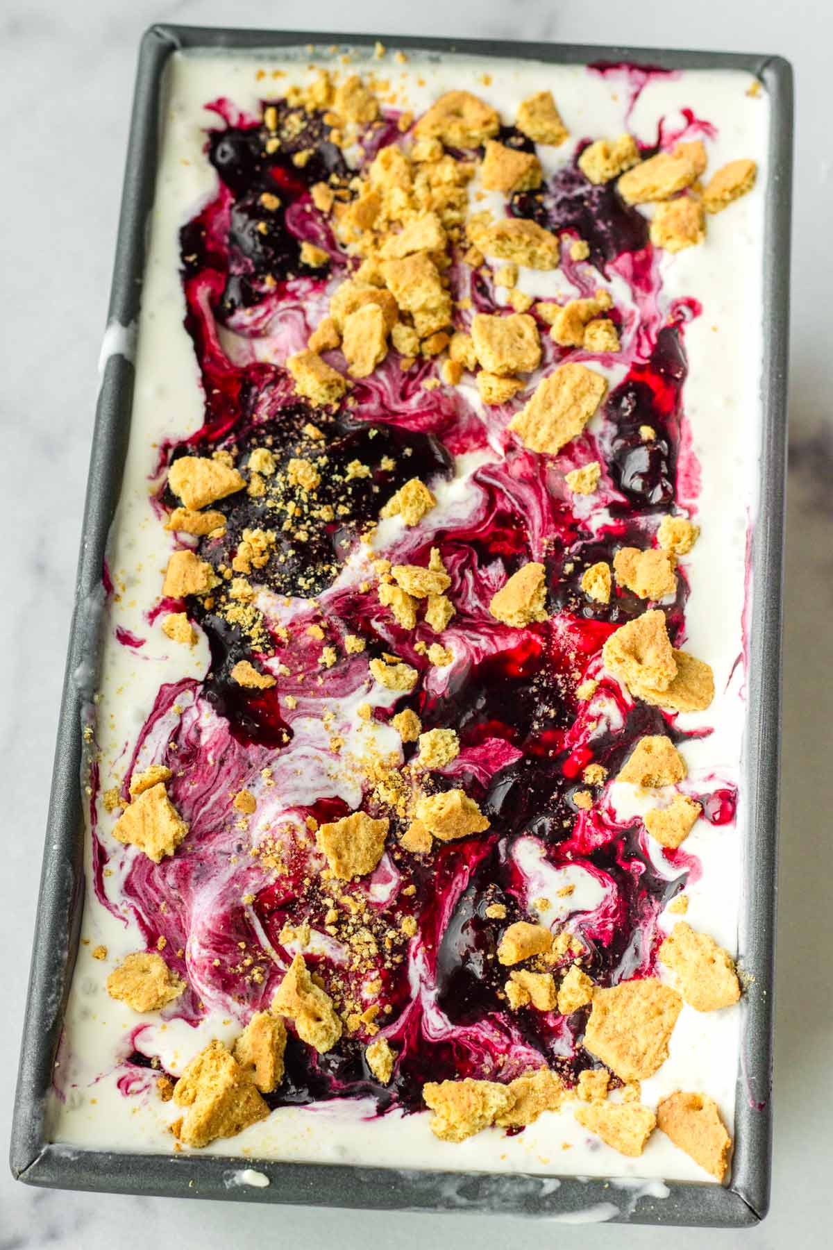 last layer of blueberry swirls and graham cracker crumbles on top