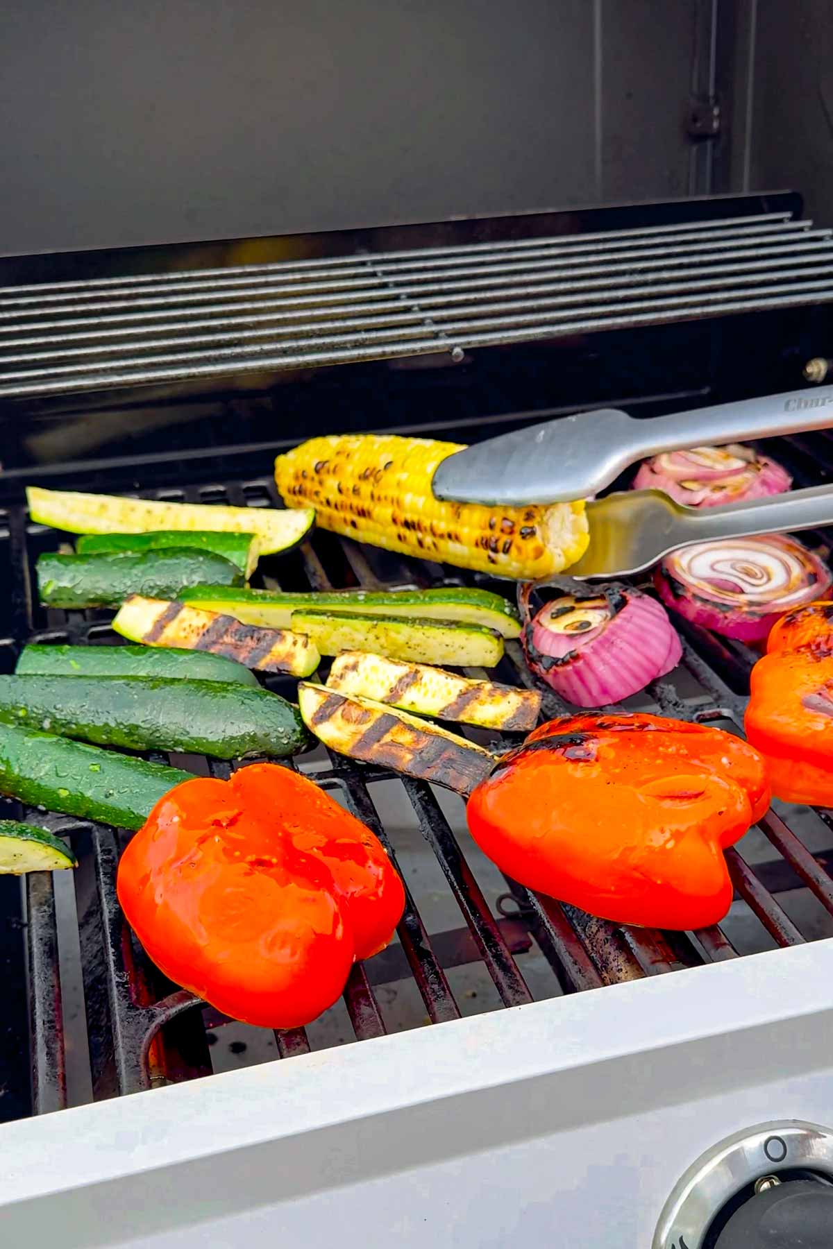 grilling vegetables on an outdoor grill