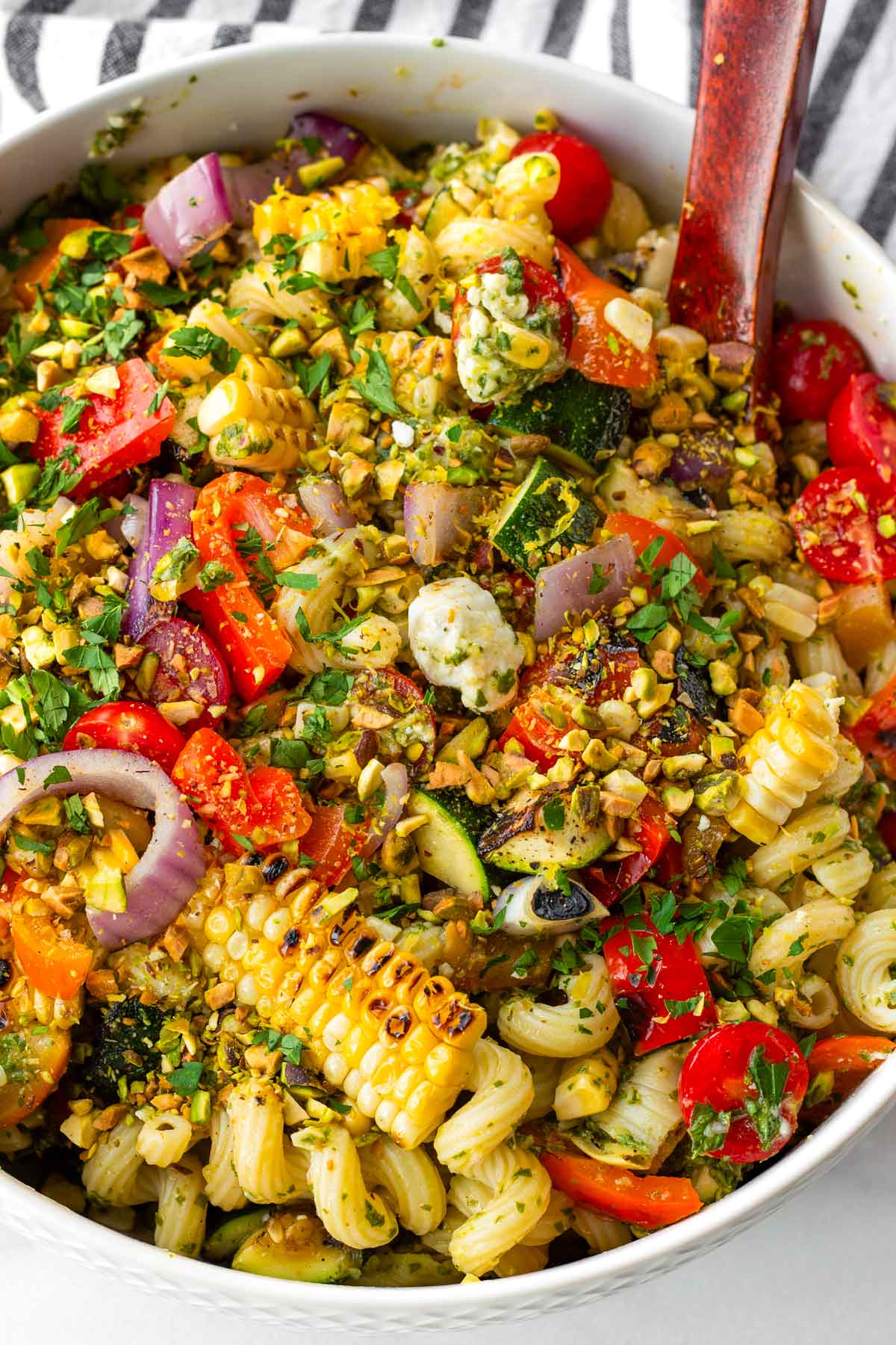 bowl with garnished grilled vegetable pasta salad
