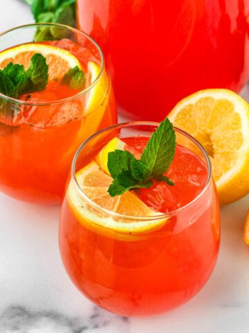 two glasses of homemade strawberry lemonade