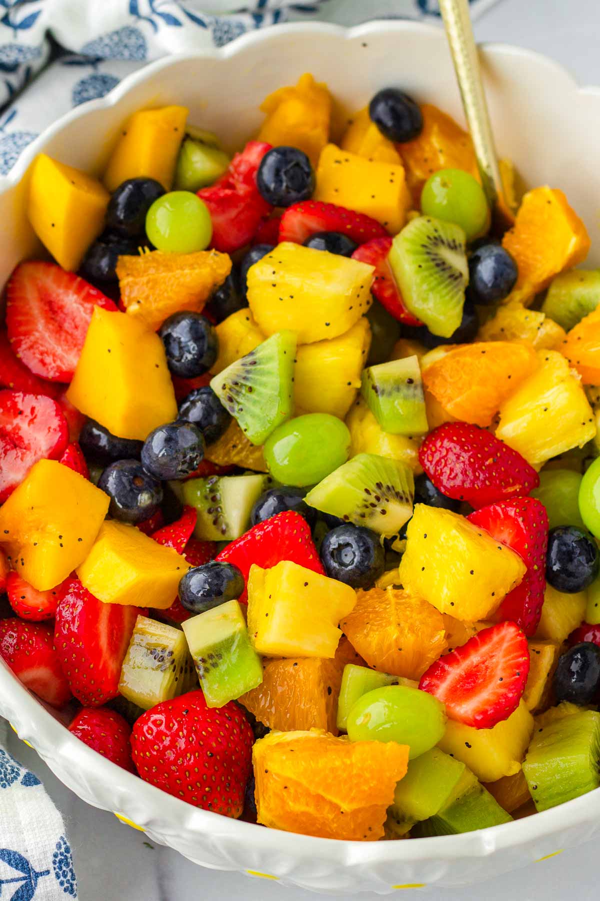 easy fruit salad with orange poppy seed dressing in bowl
