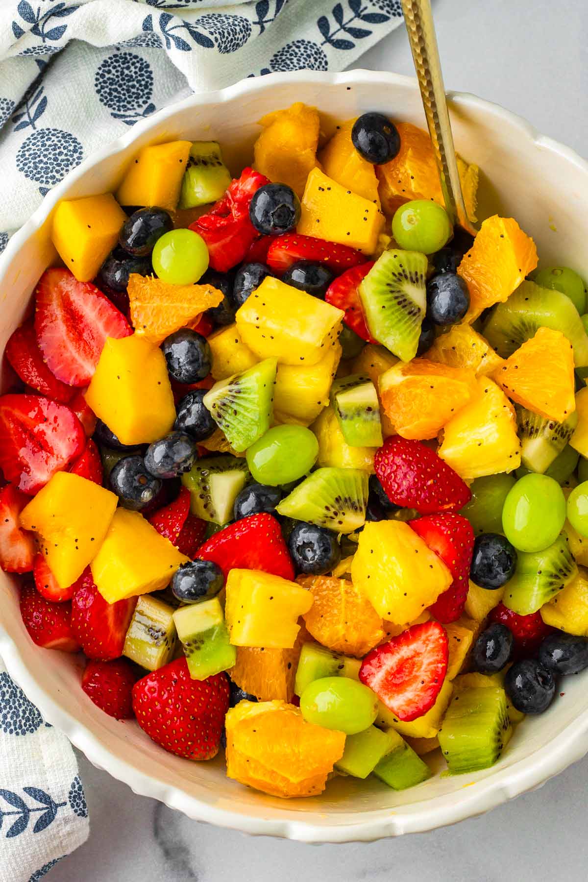 fruit salad with rainbow colors with napkin
