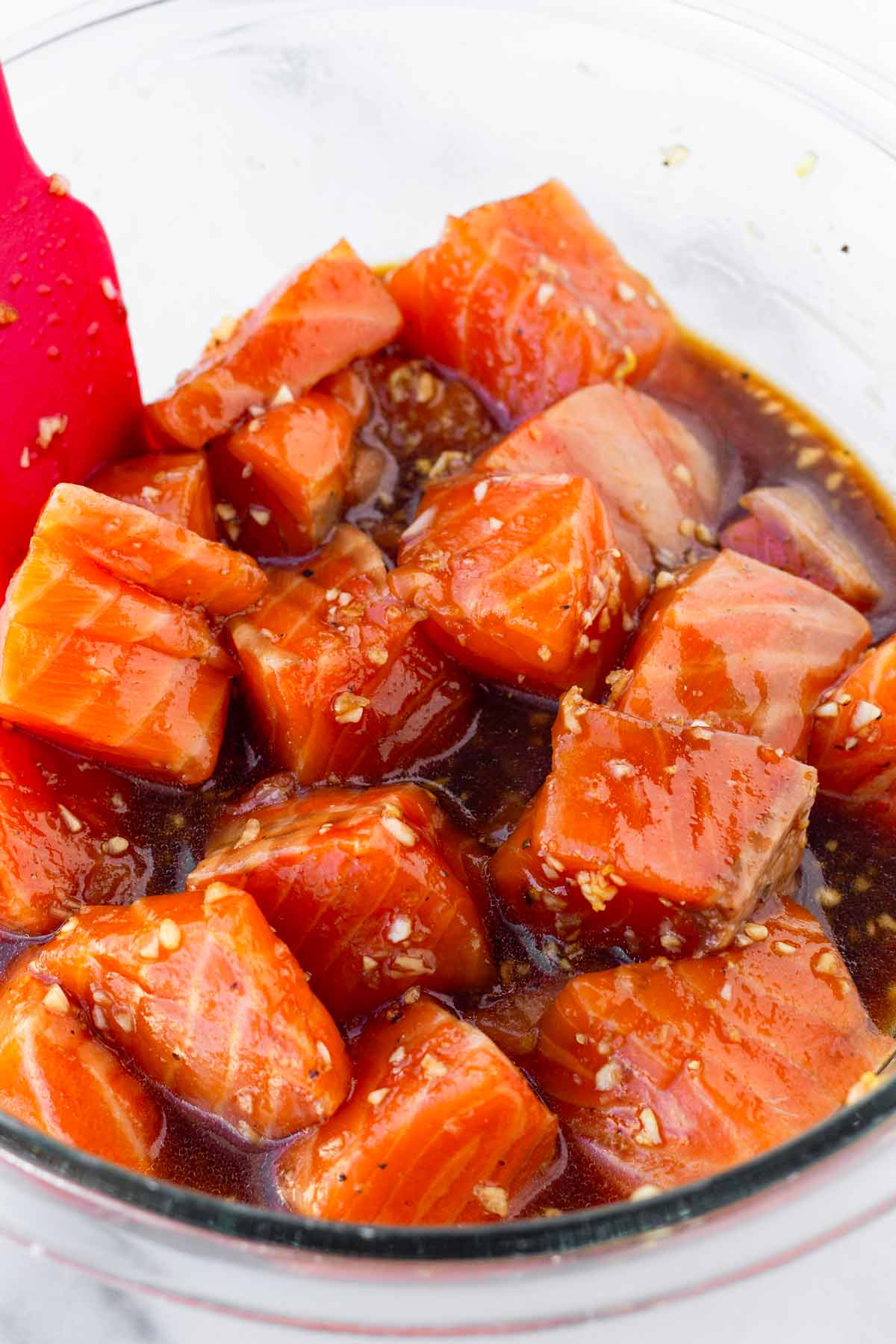 marinating salmon cubes with soy honey marinade