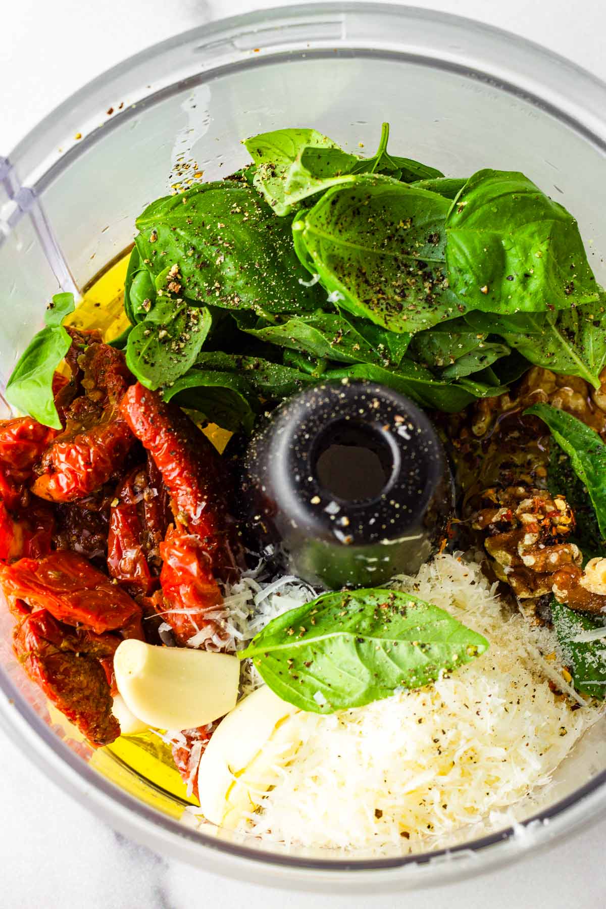 all ingredients arranged in a food processor bowl