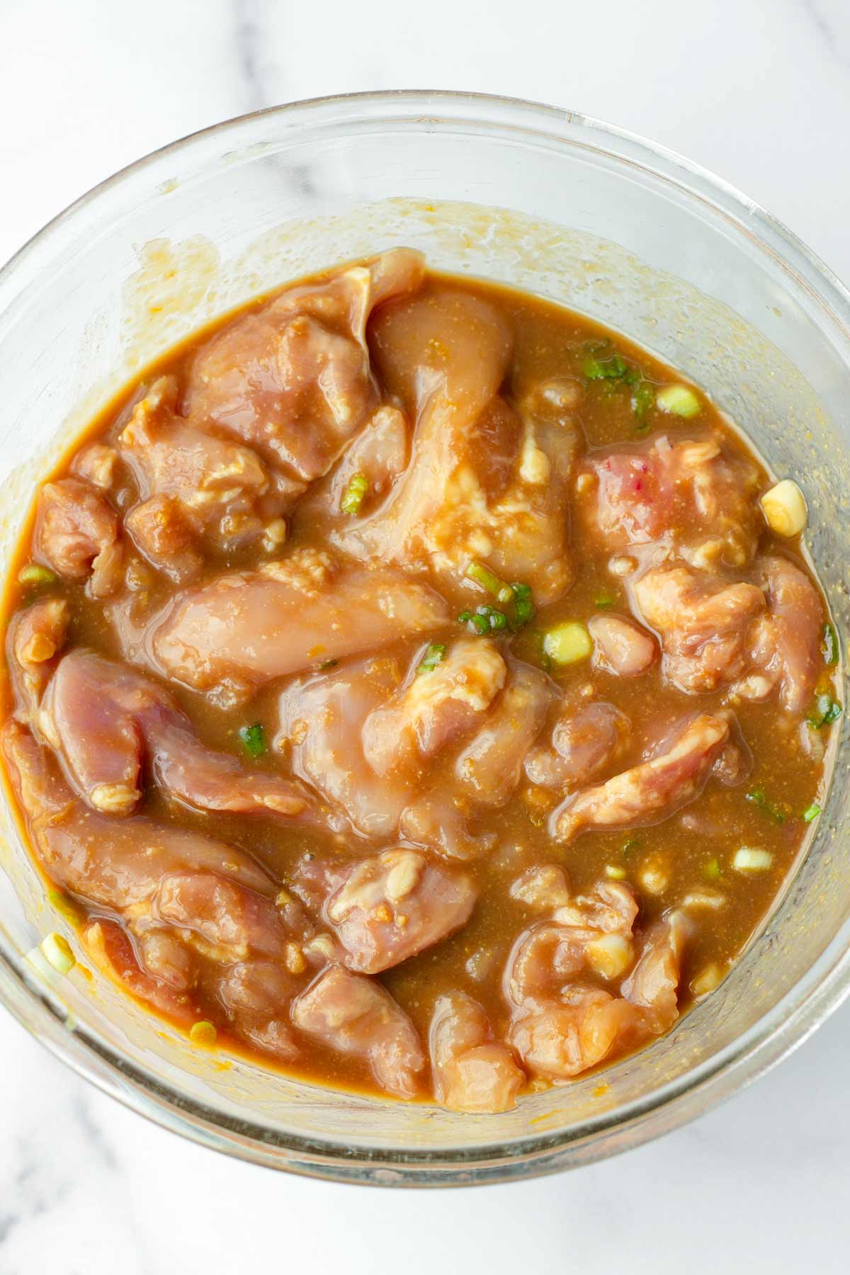 marinated chicken thighs in a bowl
