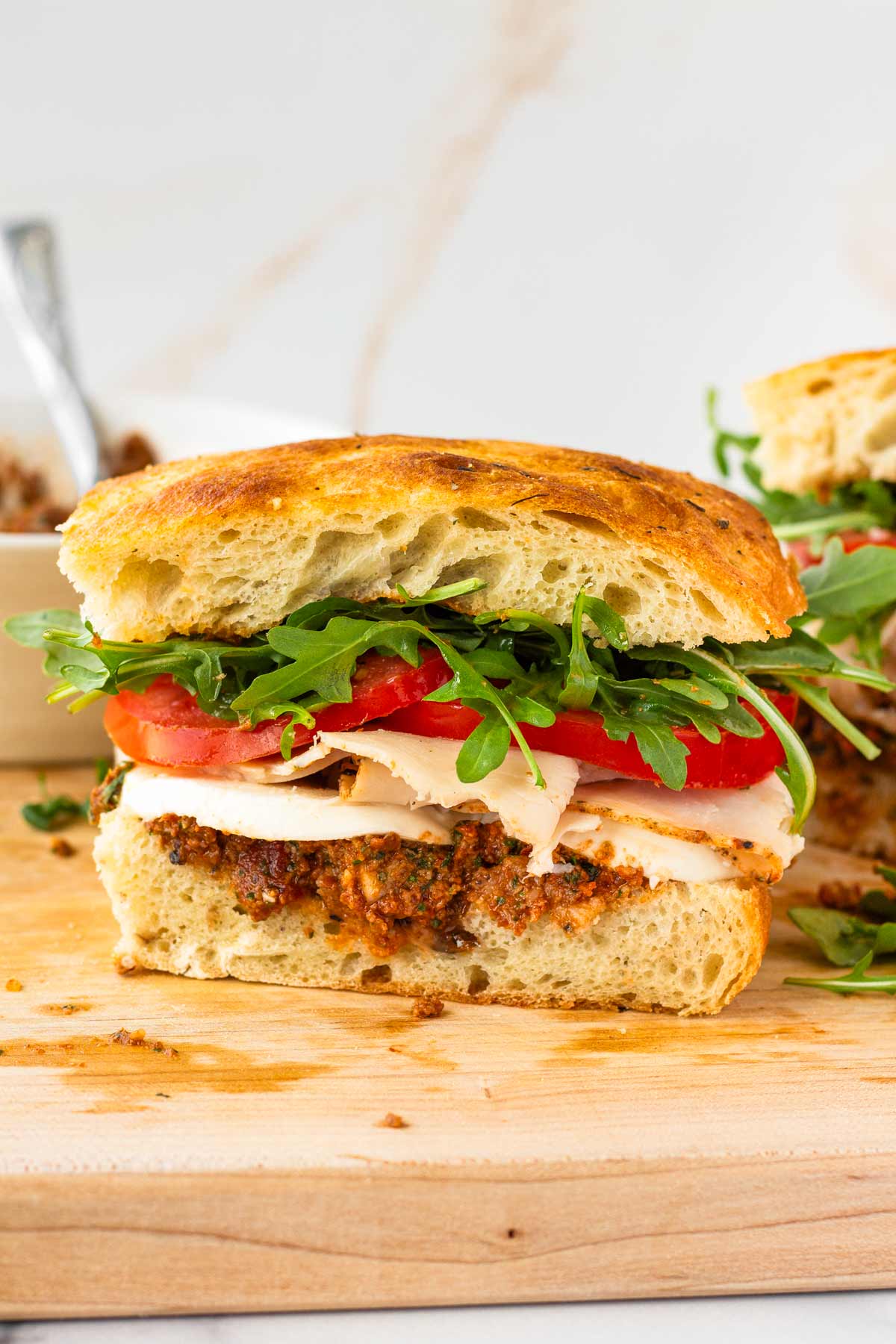 front view of turkey mozzarella focaccia sandwich