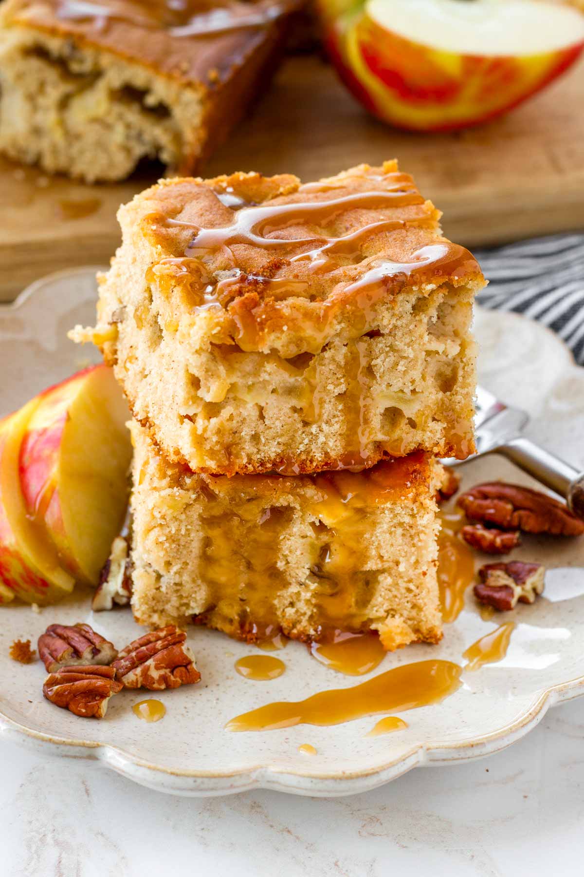 fresh apple cake snack with pecans and caramel drizzle