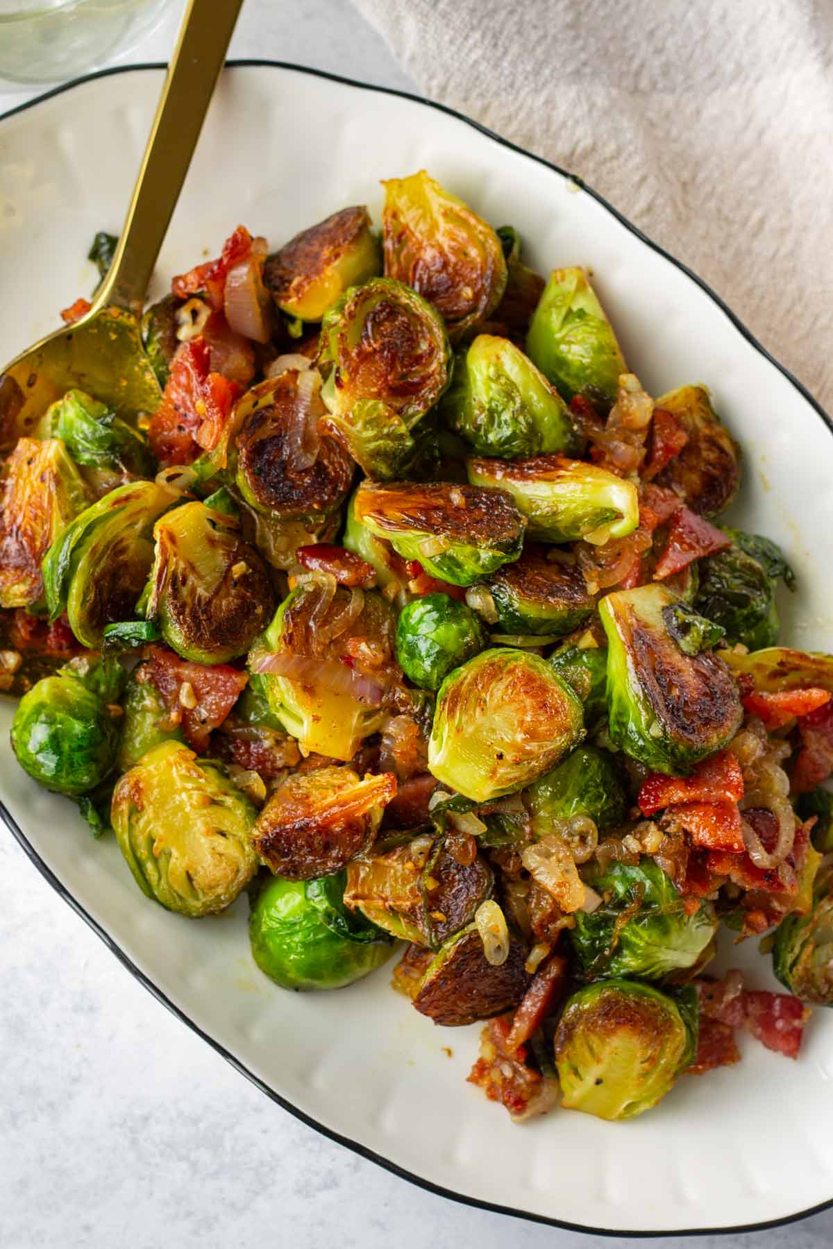 brussels sprouts with bacon on oval shaped plate