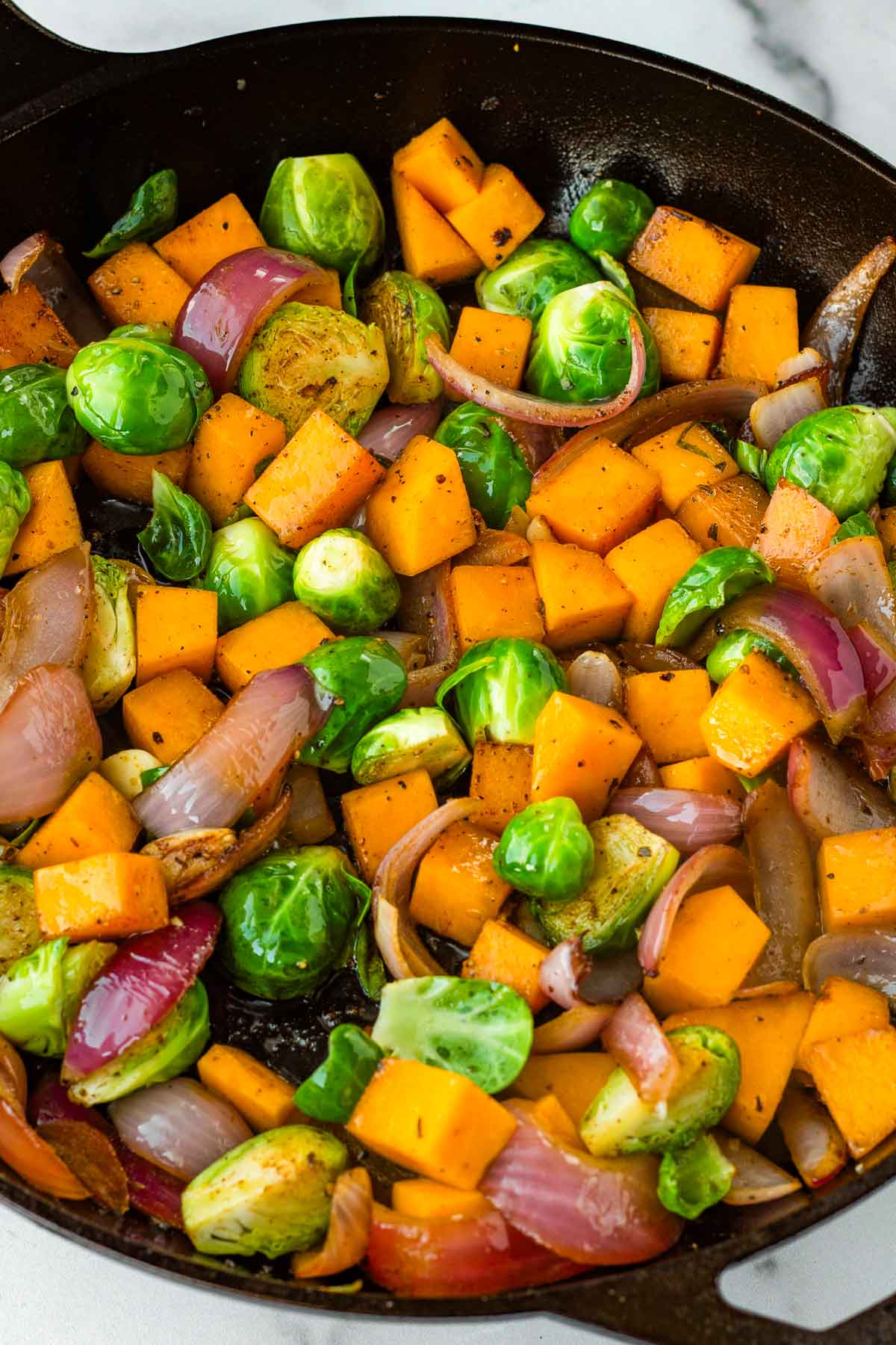 sauteing brussels sprouts and butternut squash in the skillet