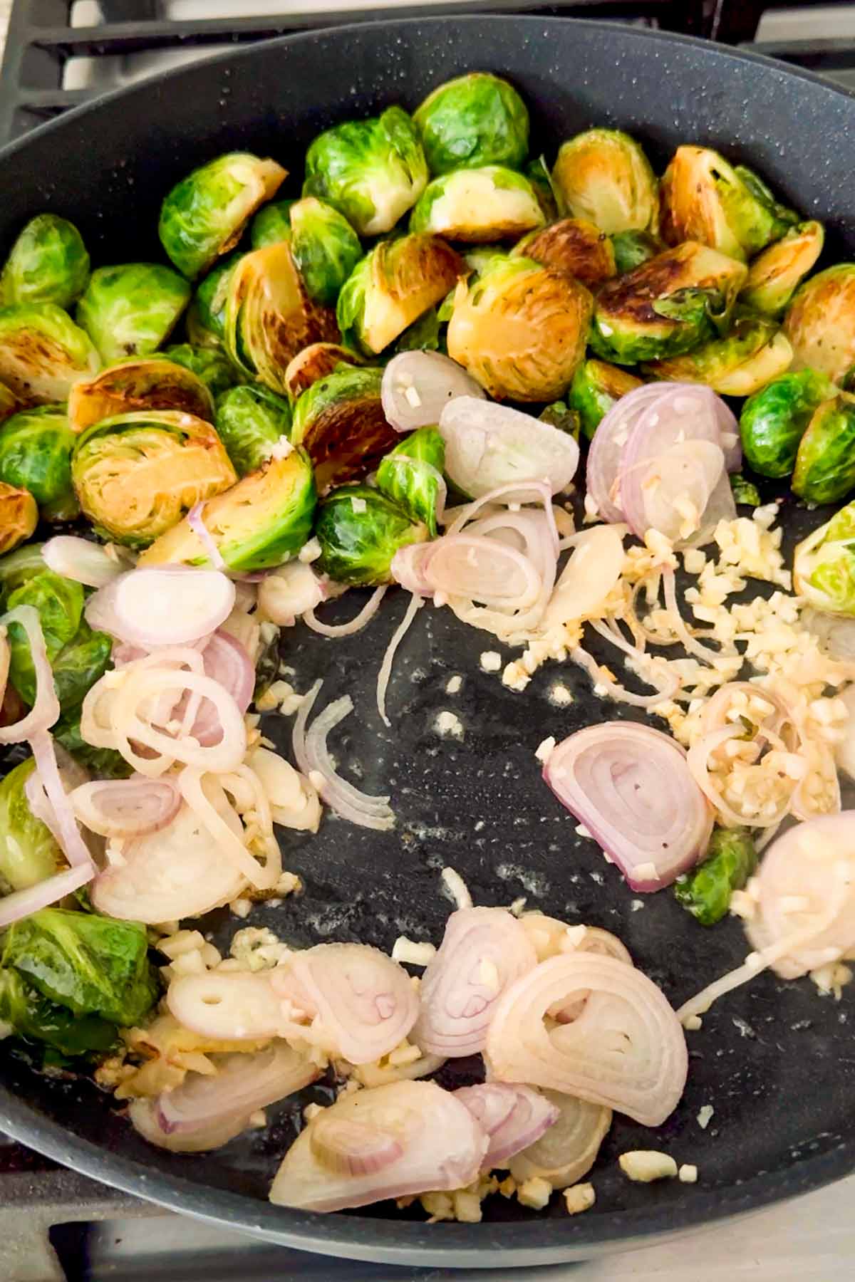 sauteeing shallots and garlic along with brussels sprouts