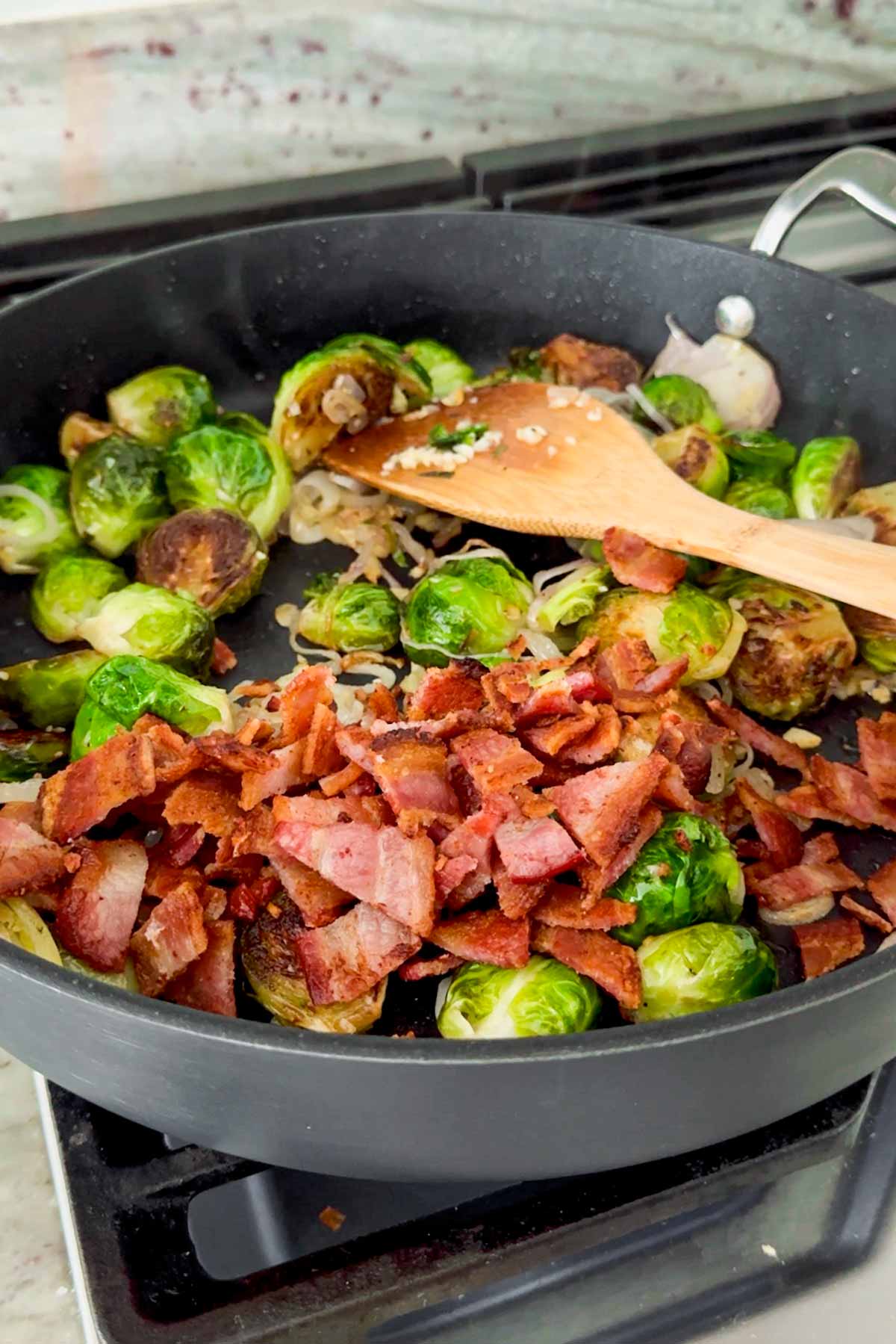 adding bacon to the skillet