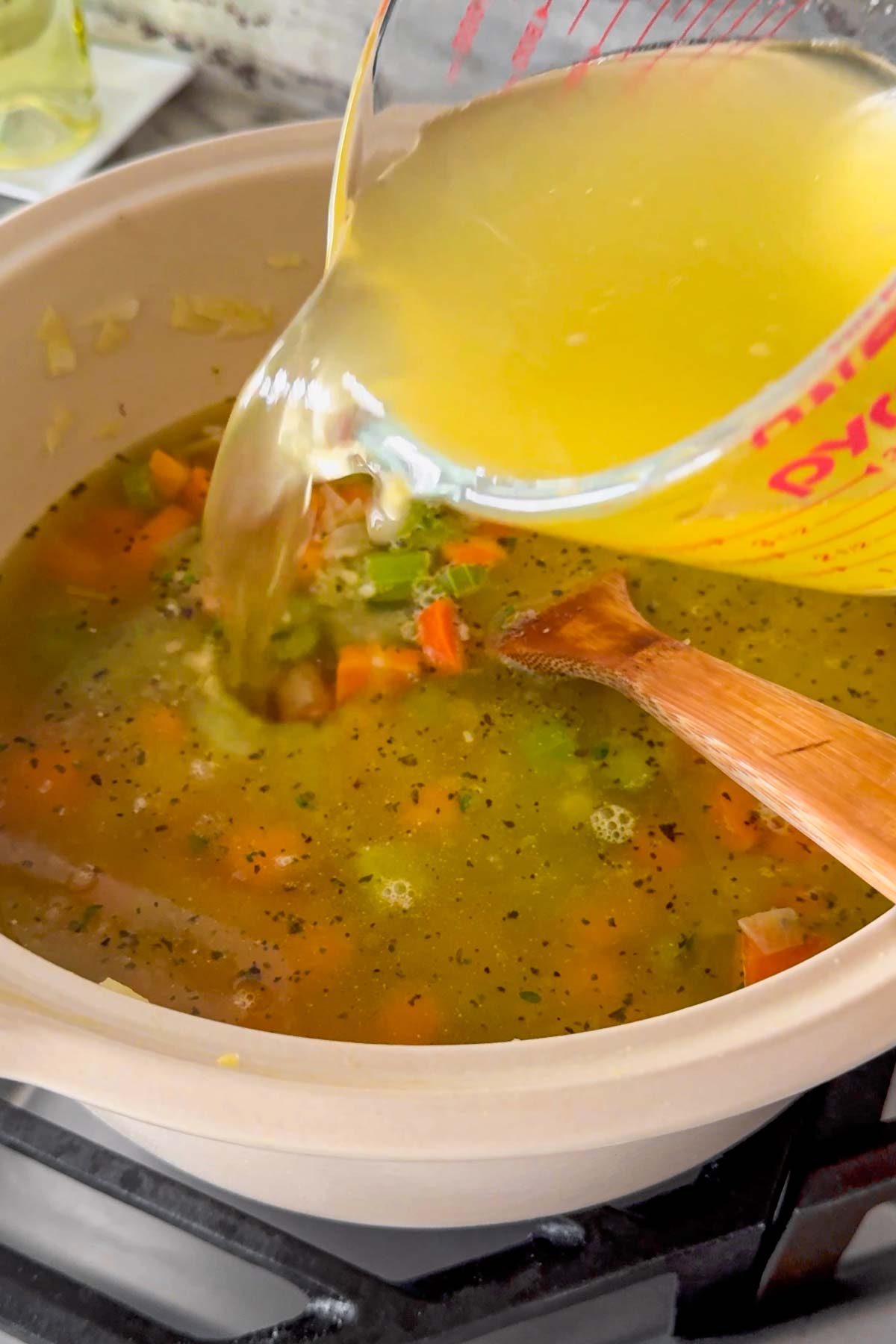 adding broth for the soup