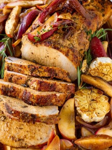 sliced pork loin roast with apples and onions