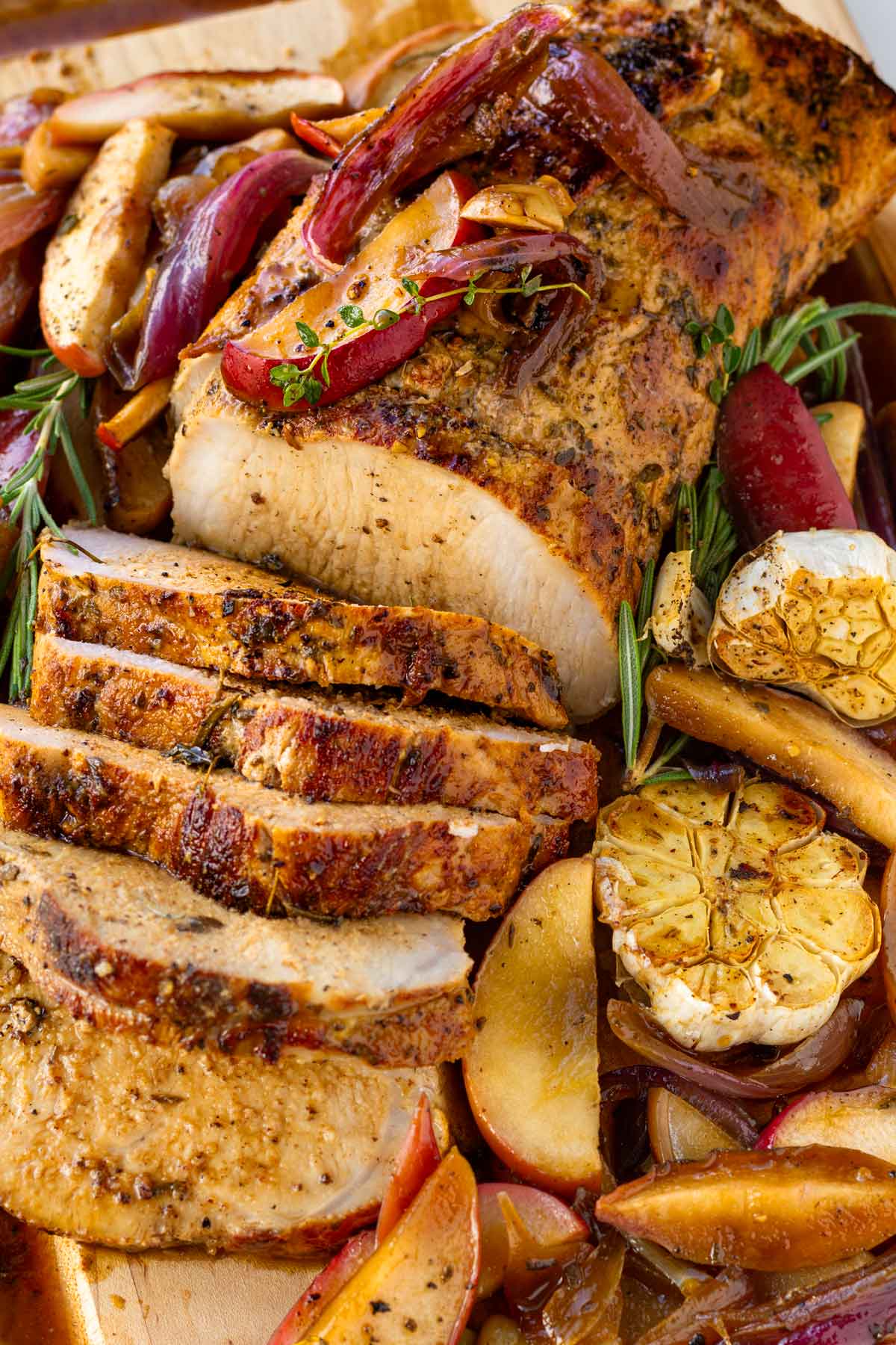 sliced pork loin roast with apples and onions