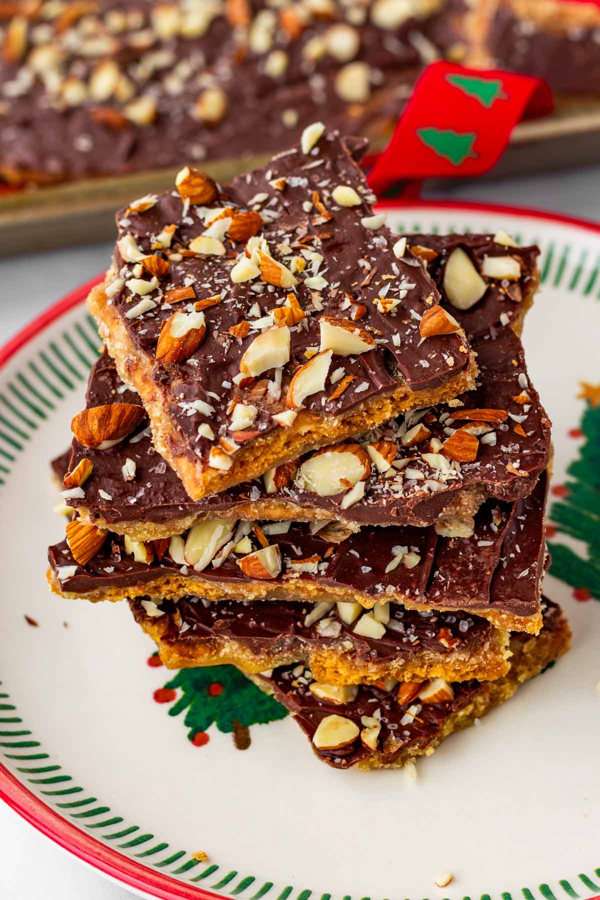 stacked graham cracker toffee on decorated plate