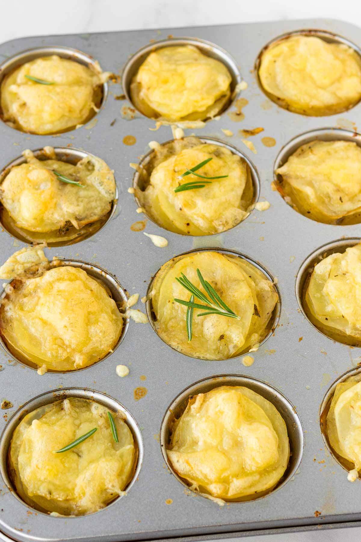 baked gruyere potato stacks in muffin tin
