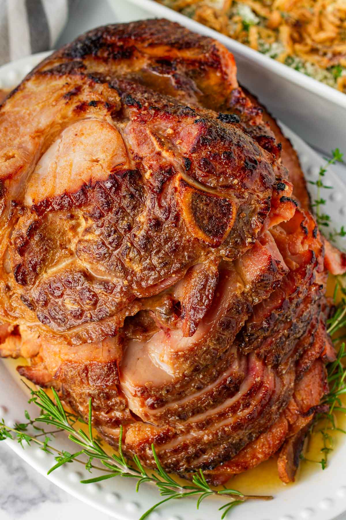 broiled and finished slow cooker glazed ham on plate