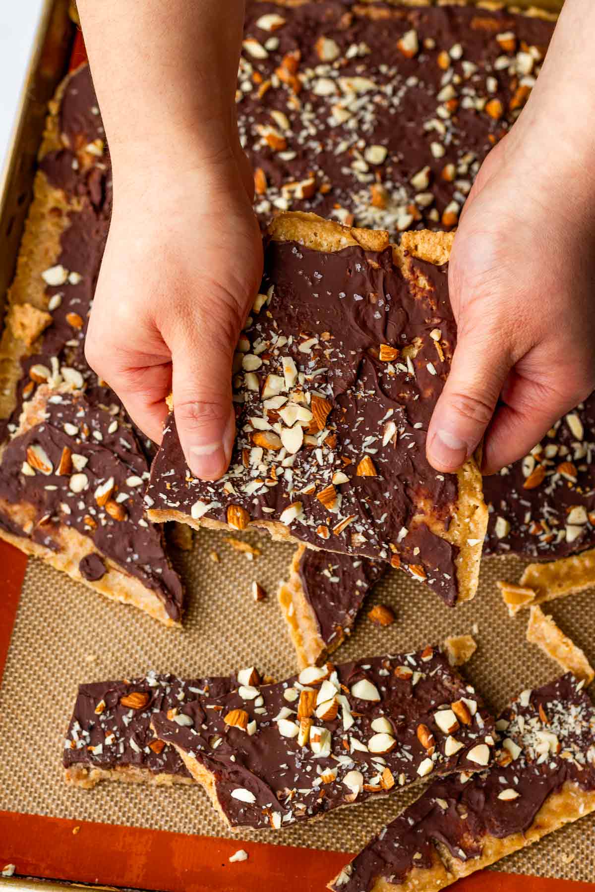 breaking up the graham cracker toffee bars into pieces