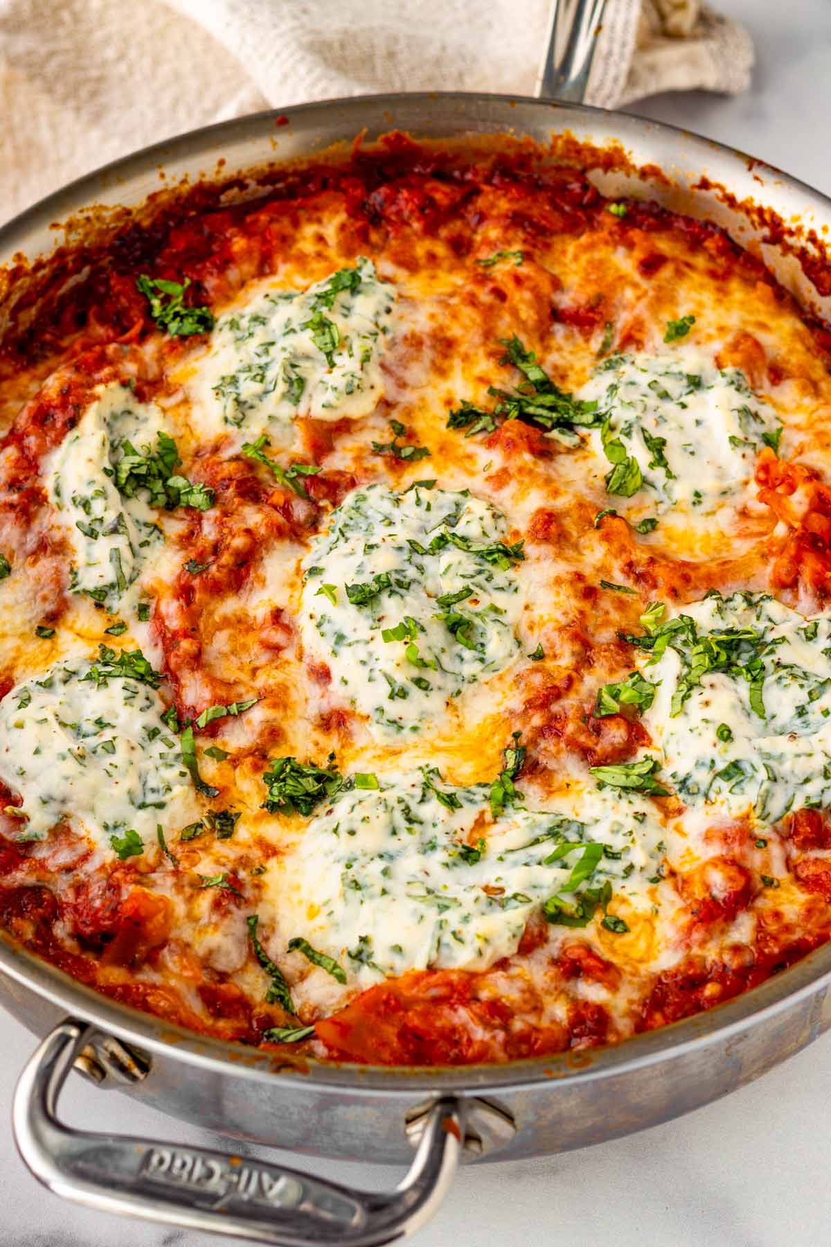 stovetop skillet lasagna with melted cheese and ricotta on top
