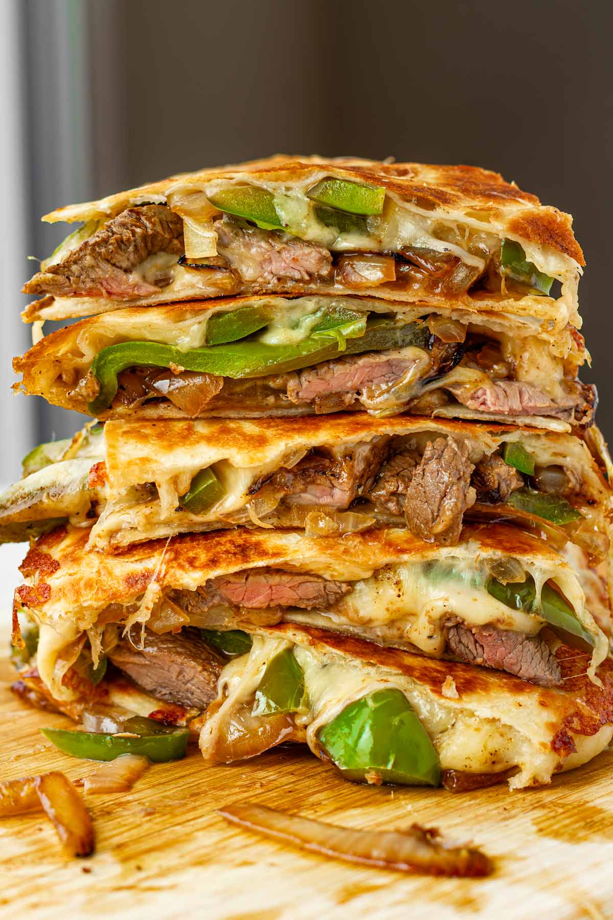 stacked sliced steak quesadillas