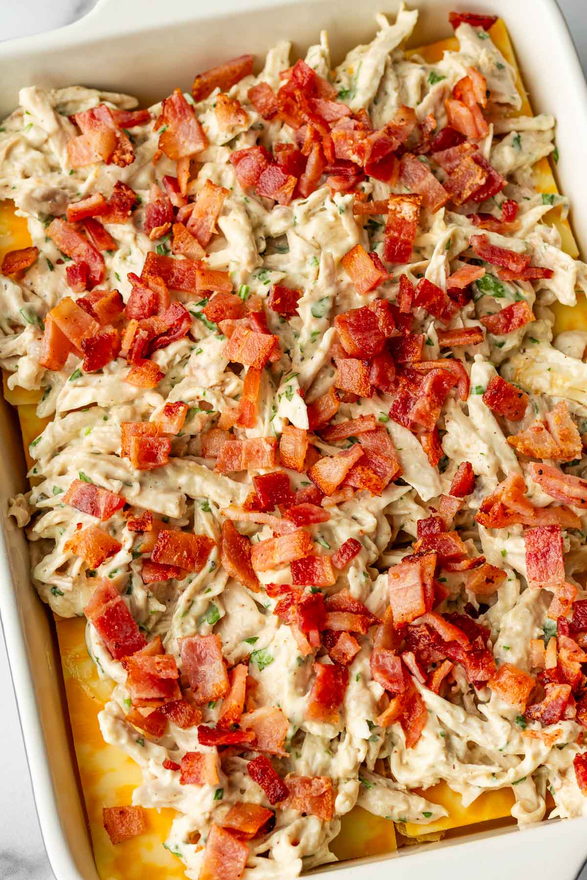 added layer of creamy chicken and bacon on sliders