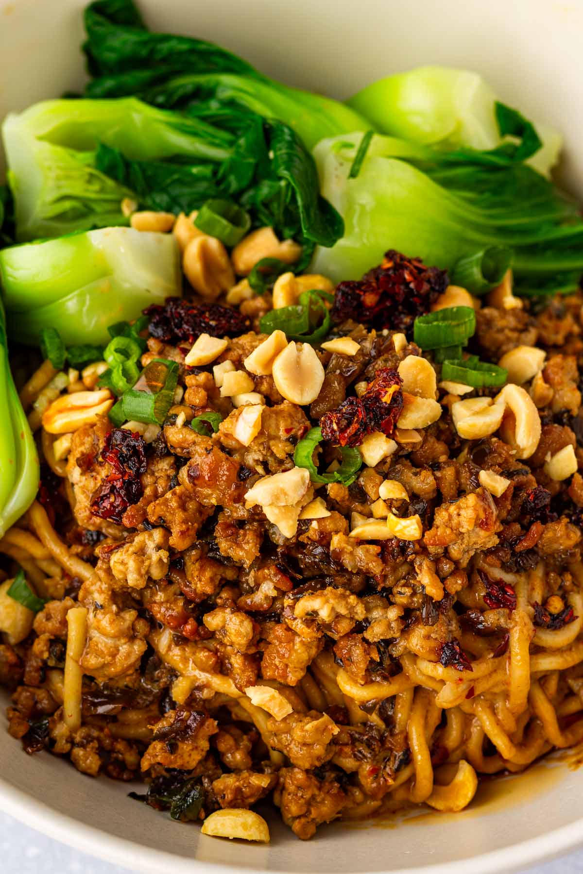saucy dan dan noodles with ground pork and peanuts