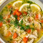lemon chicken orzo soup with dill garnish