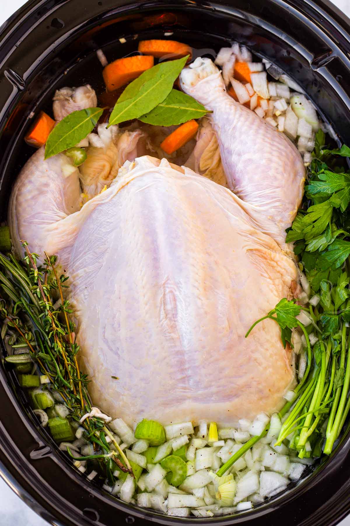 added aromatics and fresh herbs to the chicken noodle soup before cooking
