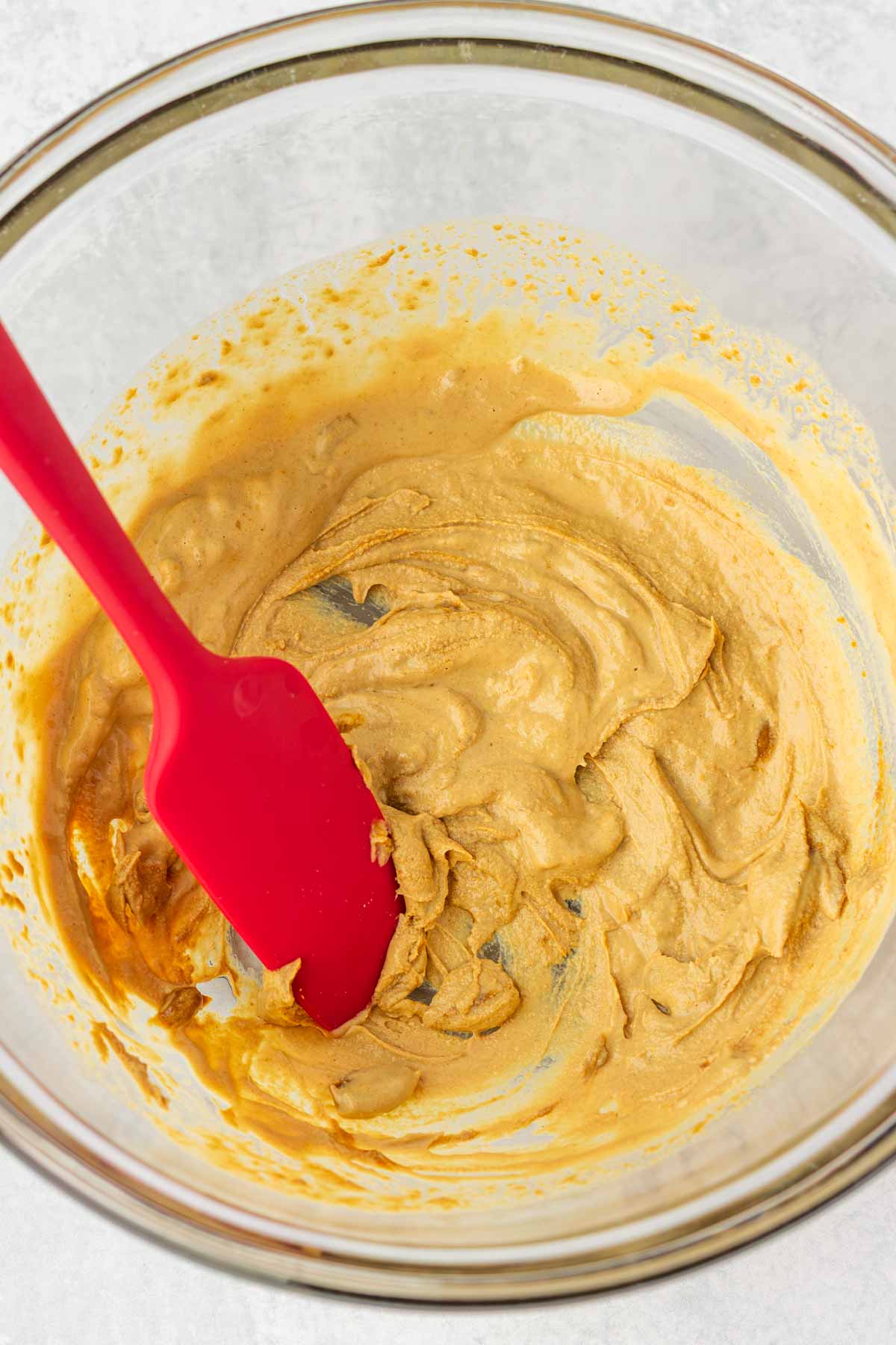 diluting sesame paste with water in bowl