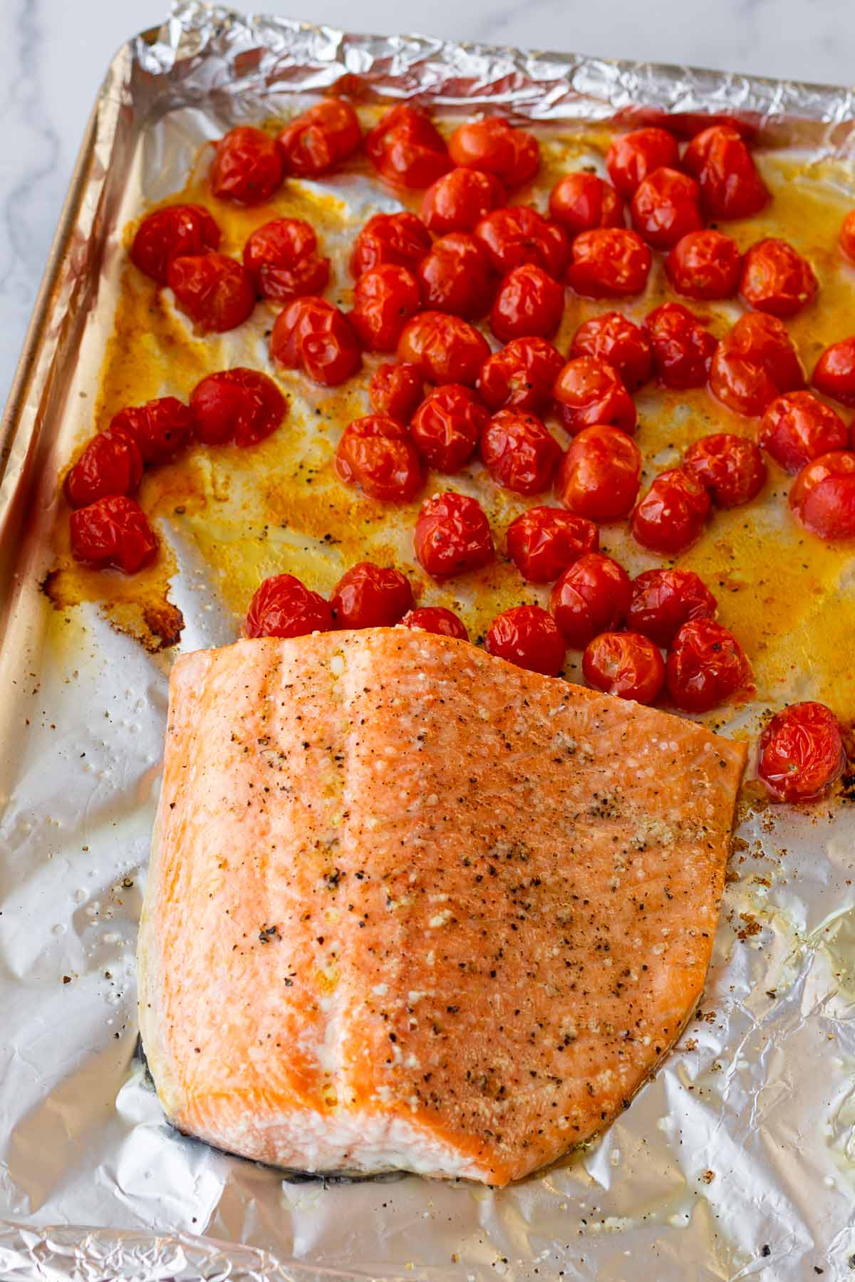 roasted salmon and jammy tomatoes out of the oven