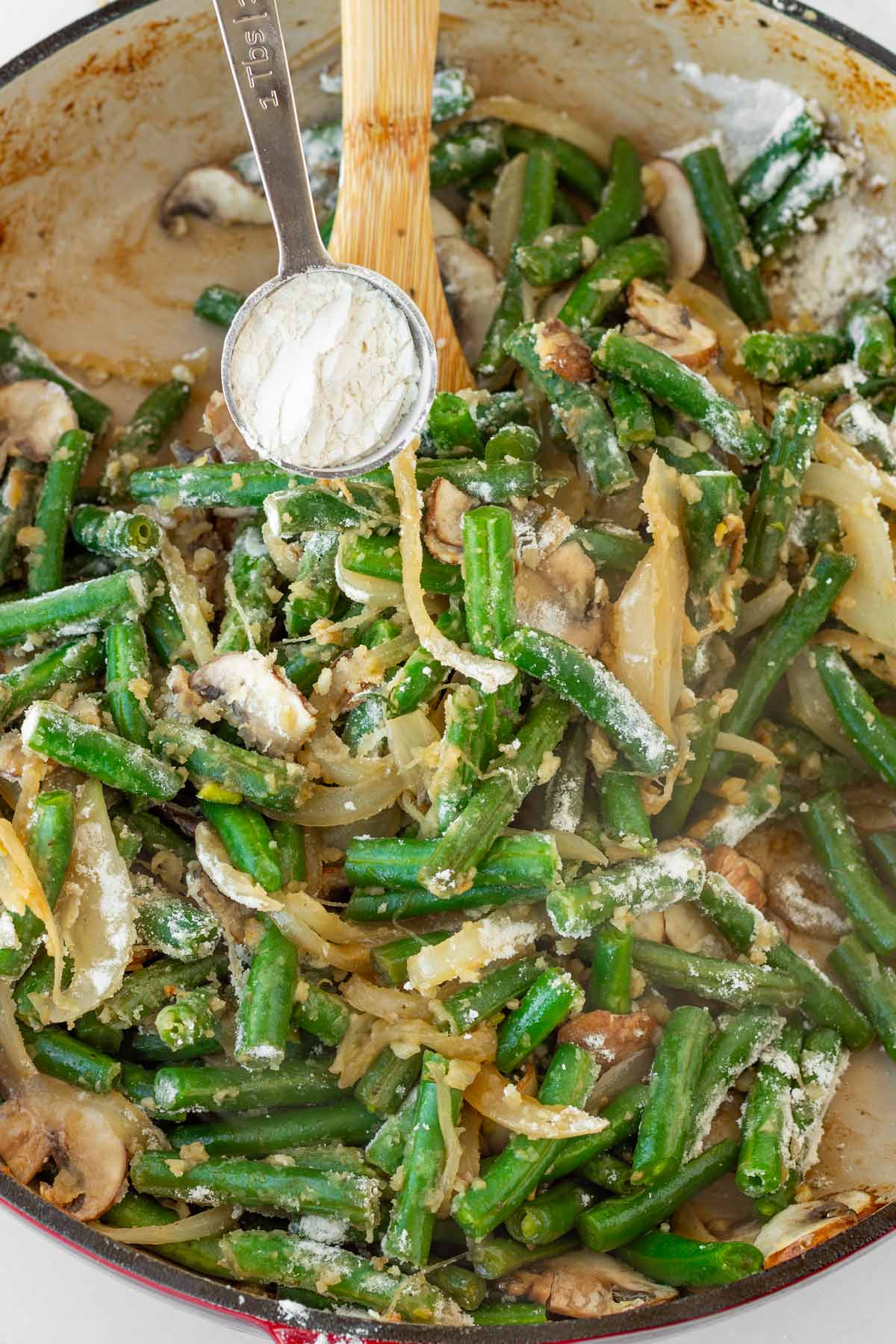 adding flour to thicken the casserole