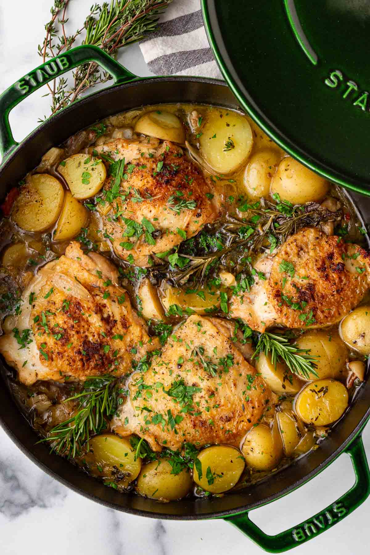 dutch oven braised chicken thighs with potatoes and leeks