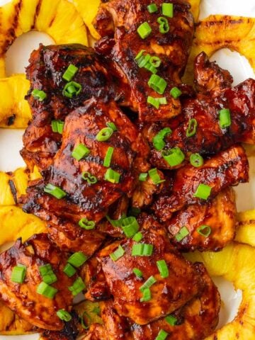 huli huli chicken grilled with pineapple rings on the bottom