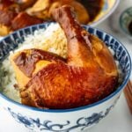 soy sauce chicken leg on rice in a bowl