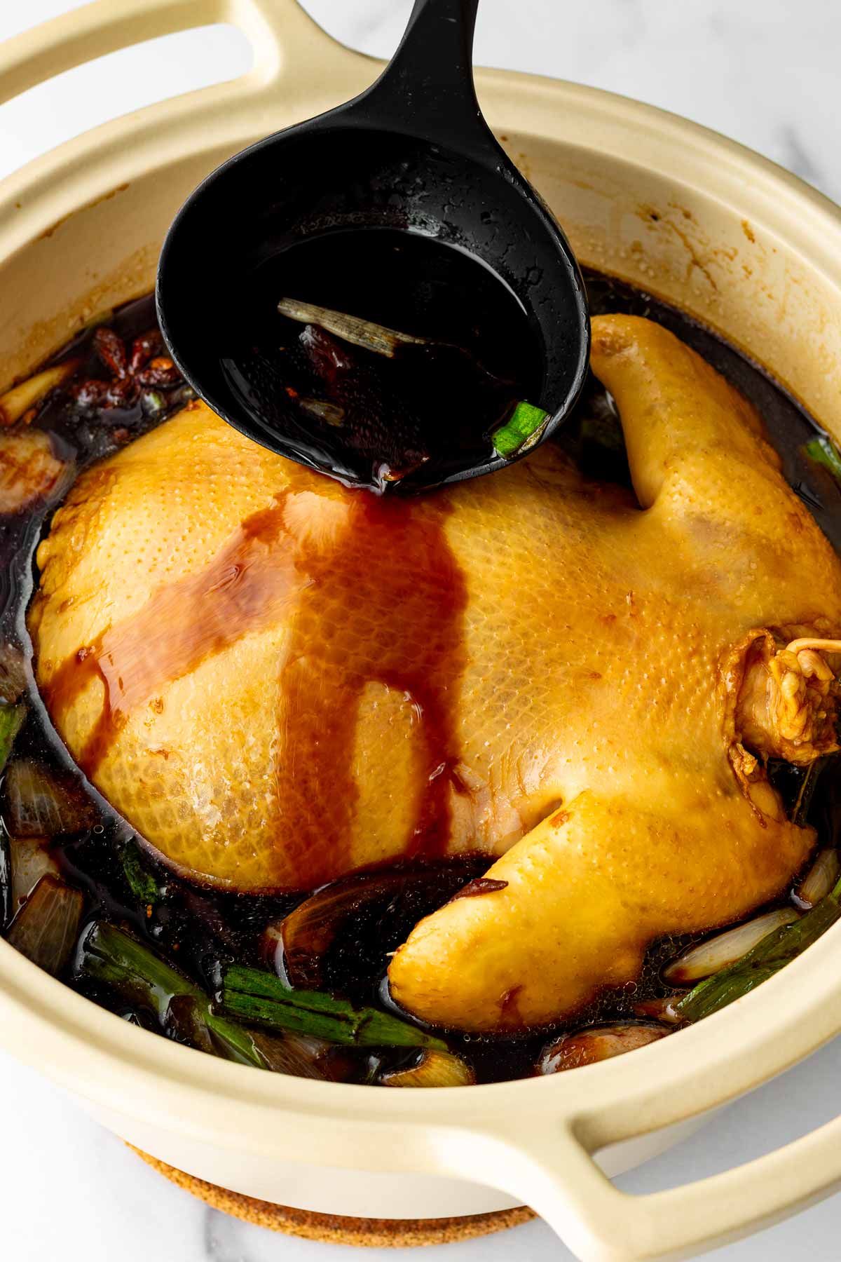 basting chicken with braising liquid
