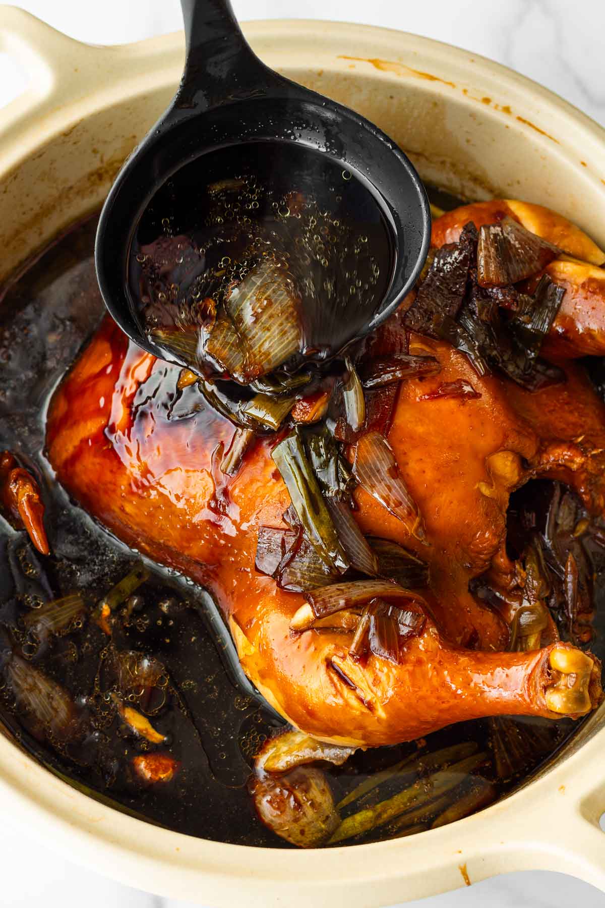 finishing basting soy sauce chicken in the pot