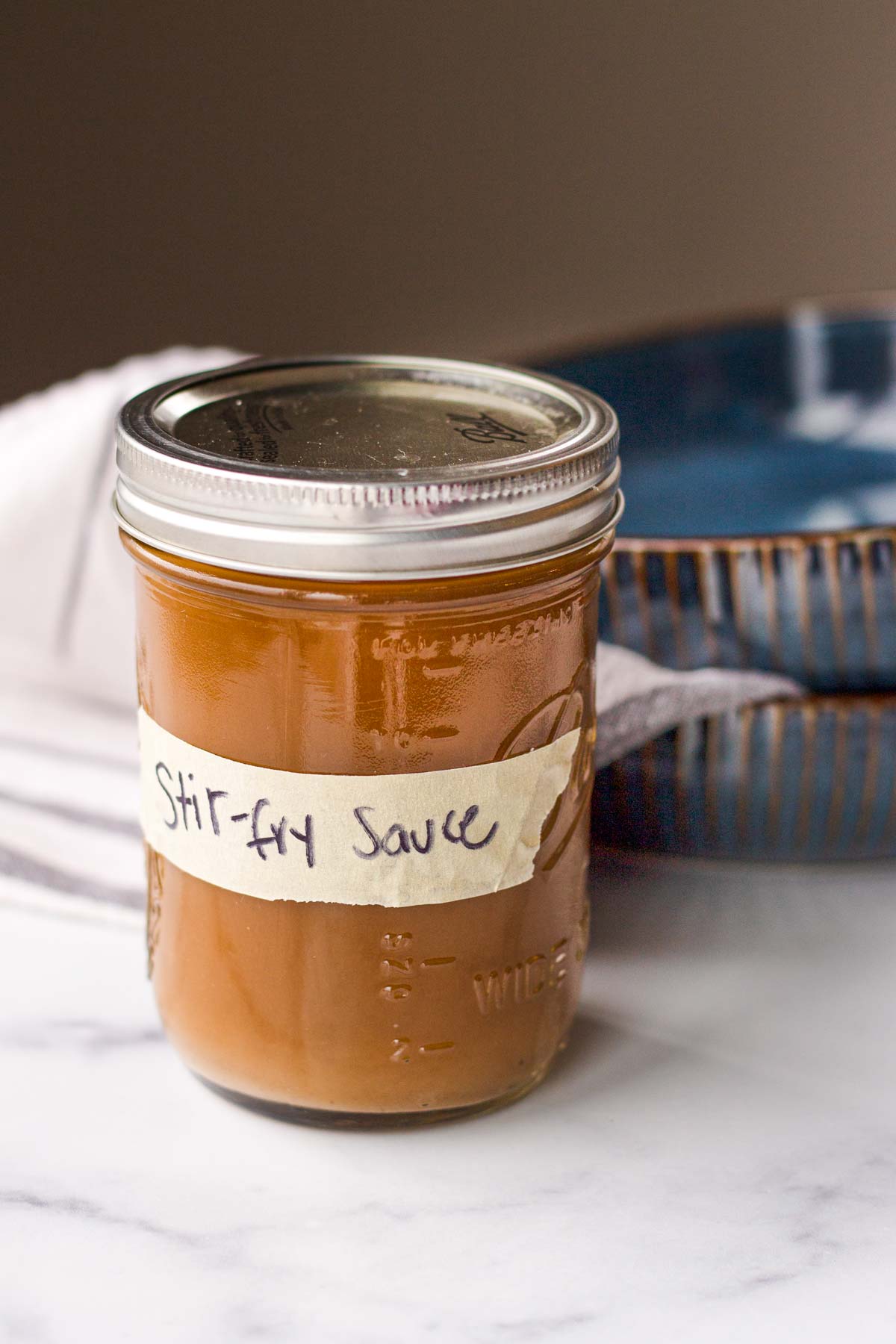 prepared stir fry sauce in a labeled jar