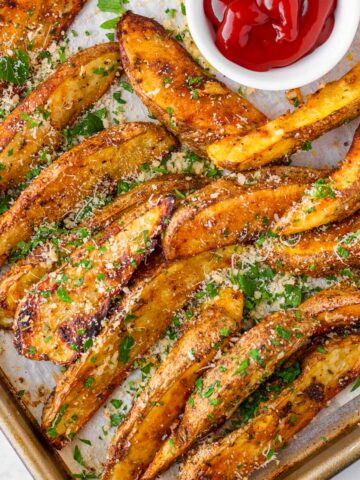baked roasted potato wedges seasoned with paprika