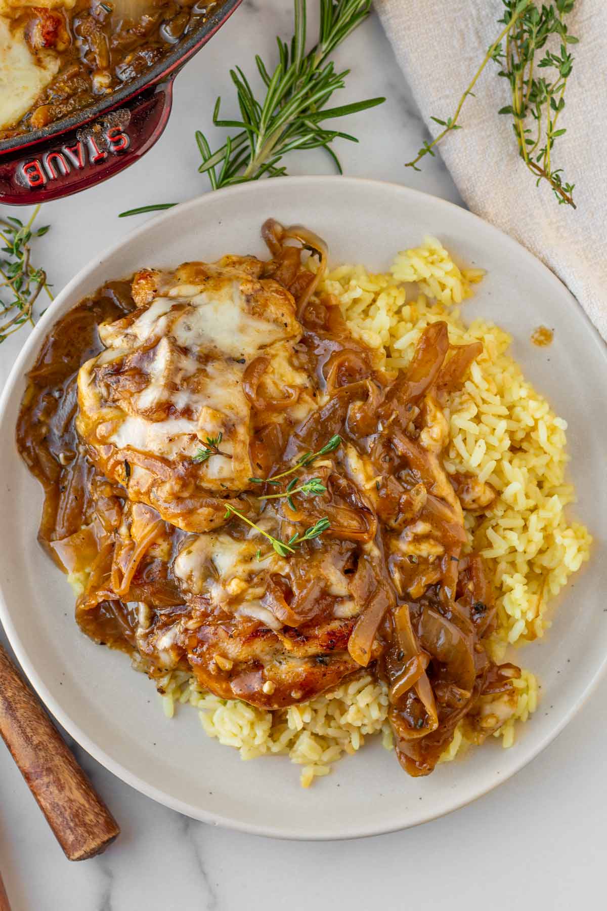 french onion soup chicken served with yellow rice pilaf