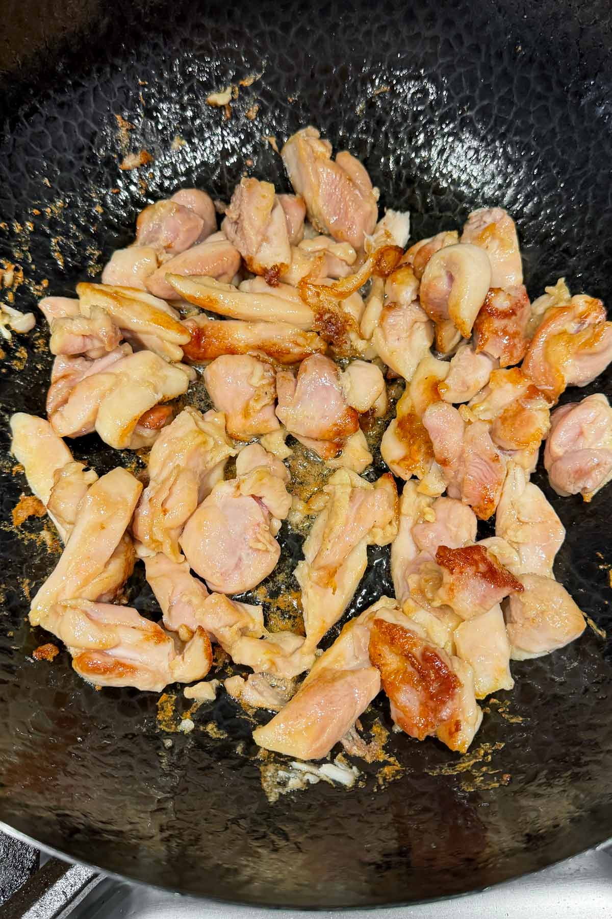 cooking chicken in the hot wok