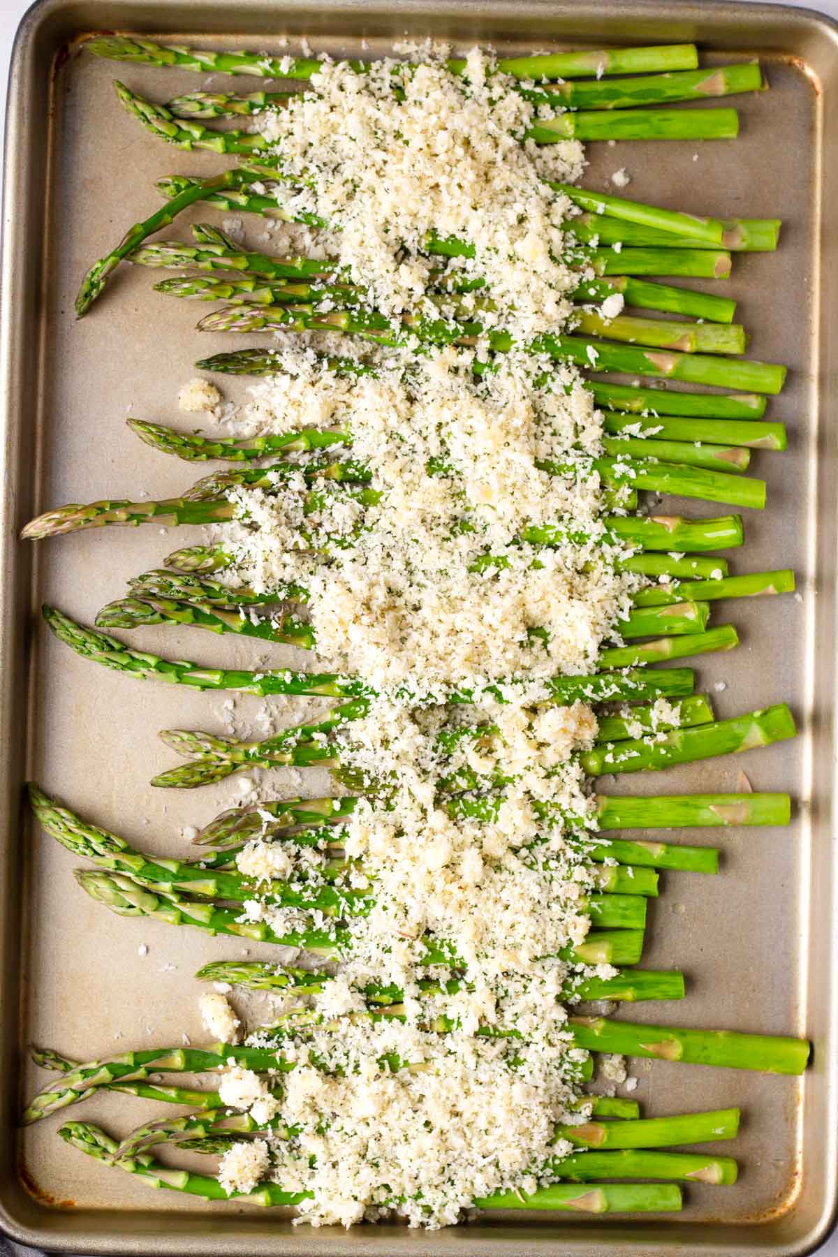 washed and trimmed asparagus with topping uncooked