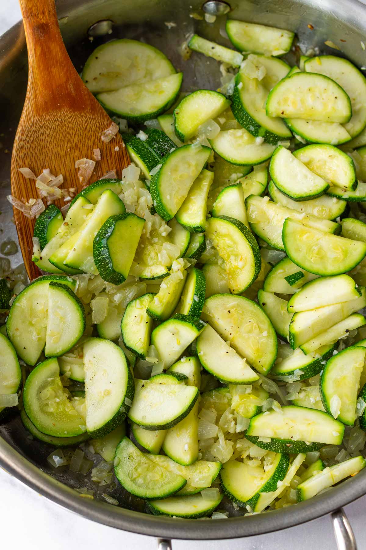 sauteeing zucchini with onions and garlic