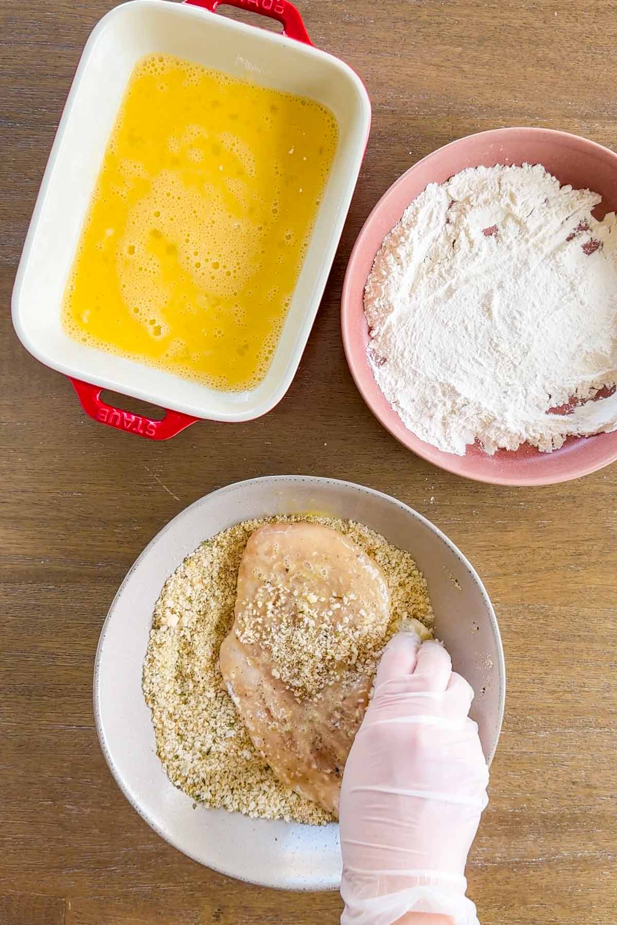dredging chicken into flour, then eggs, then panko mixture