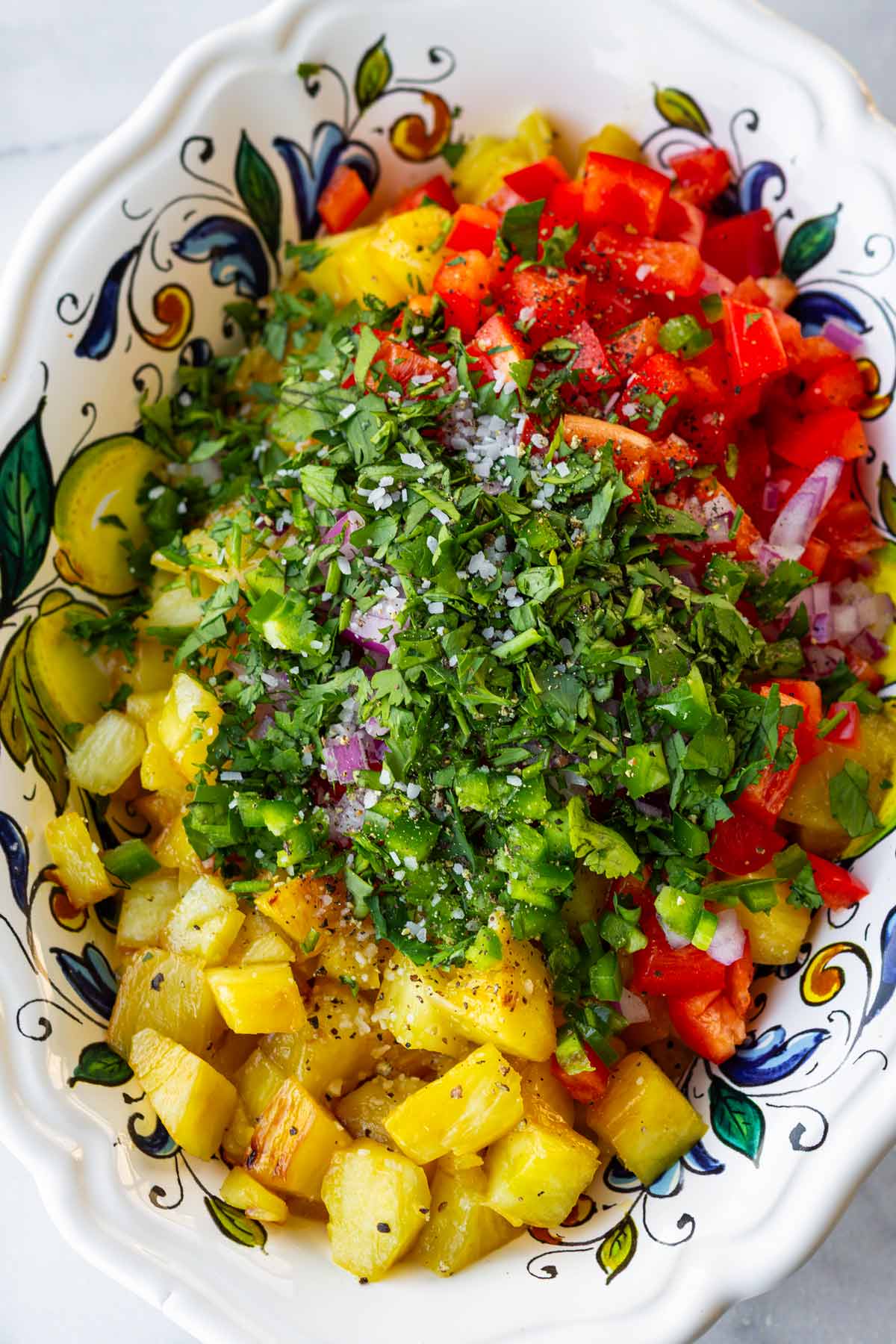 combined ingredients for pineapple salsa in bowl