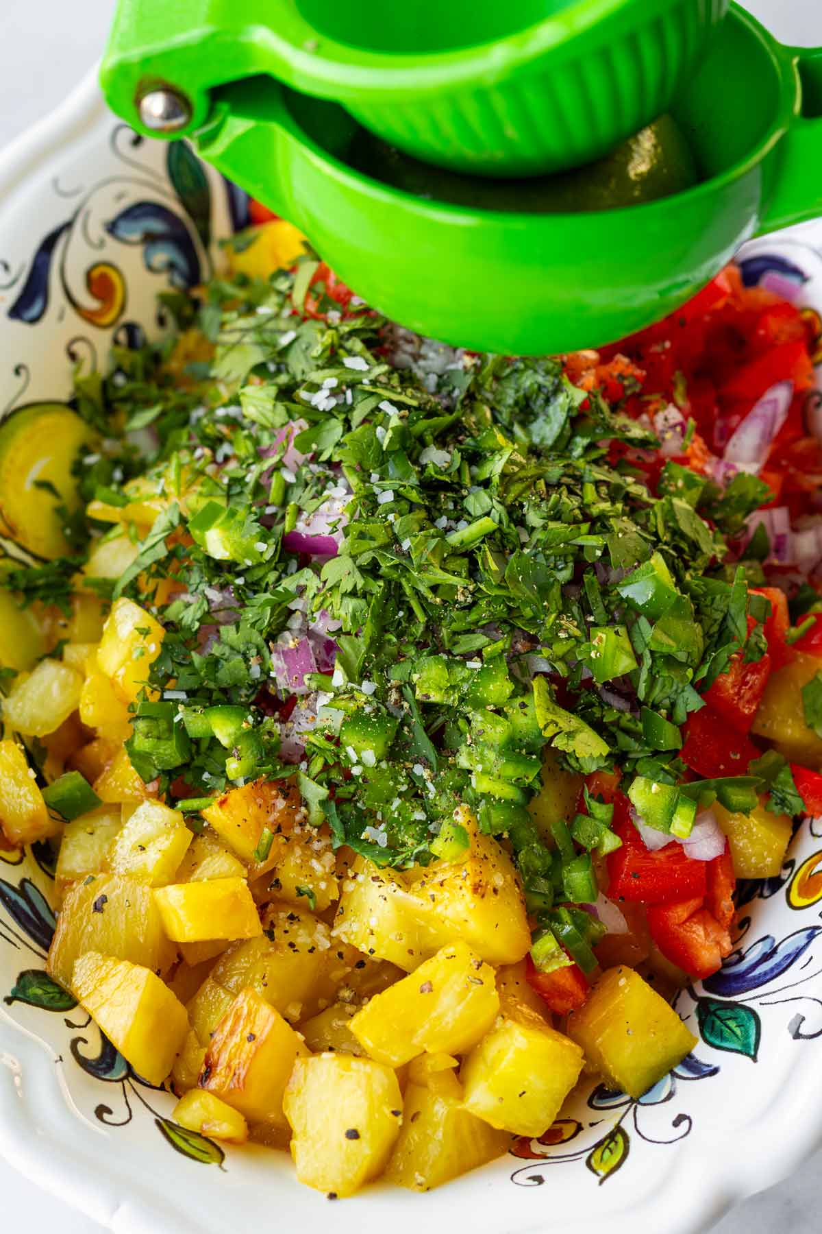 adding lime juice to salsa
