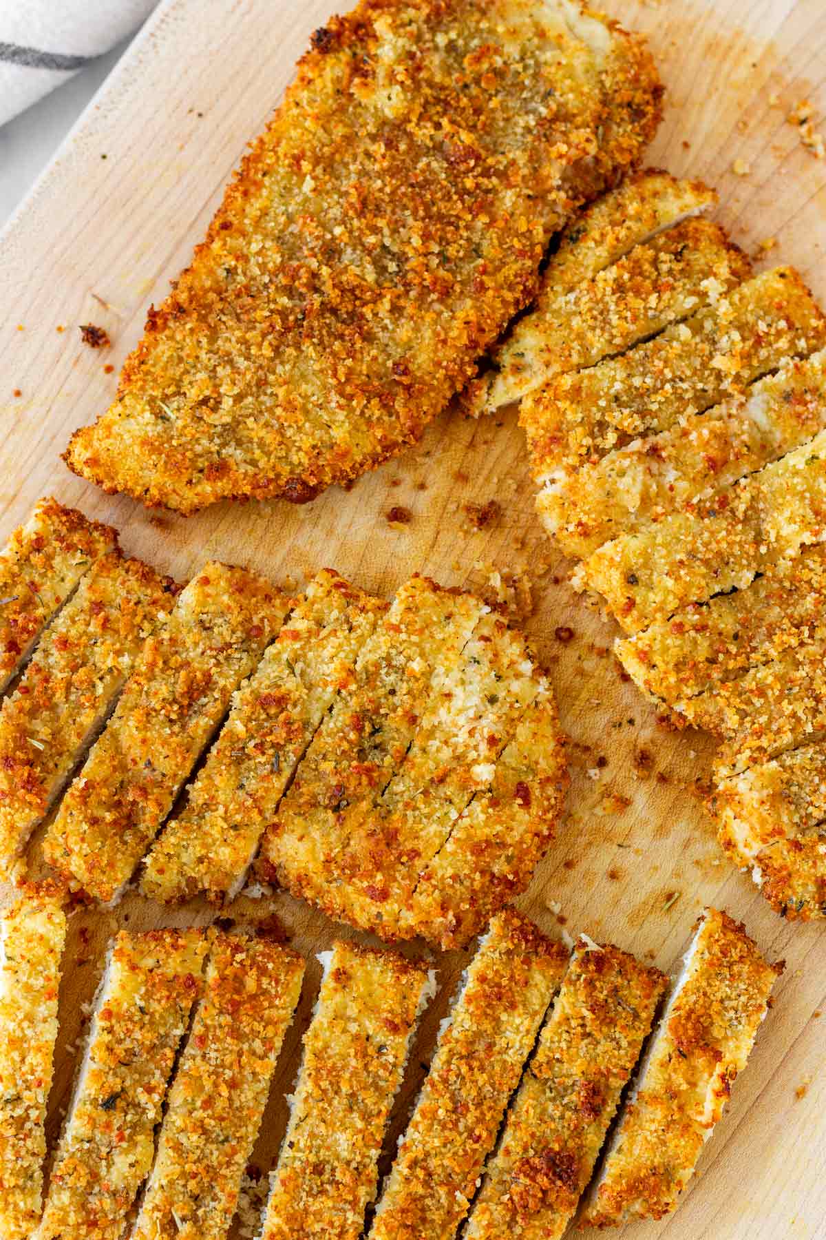 sliced chicken cutlets cooked golden and crispy
