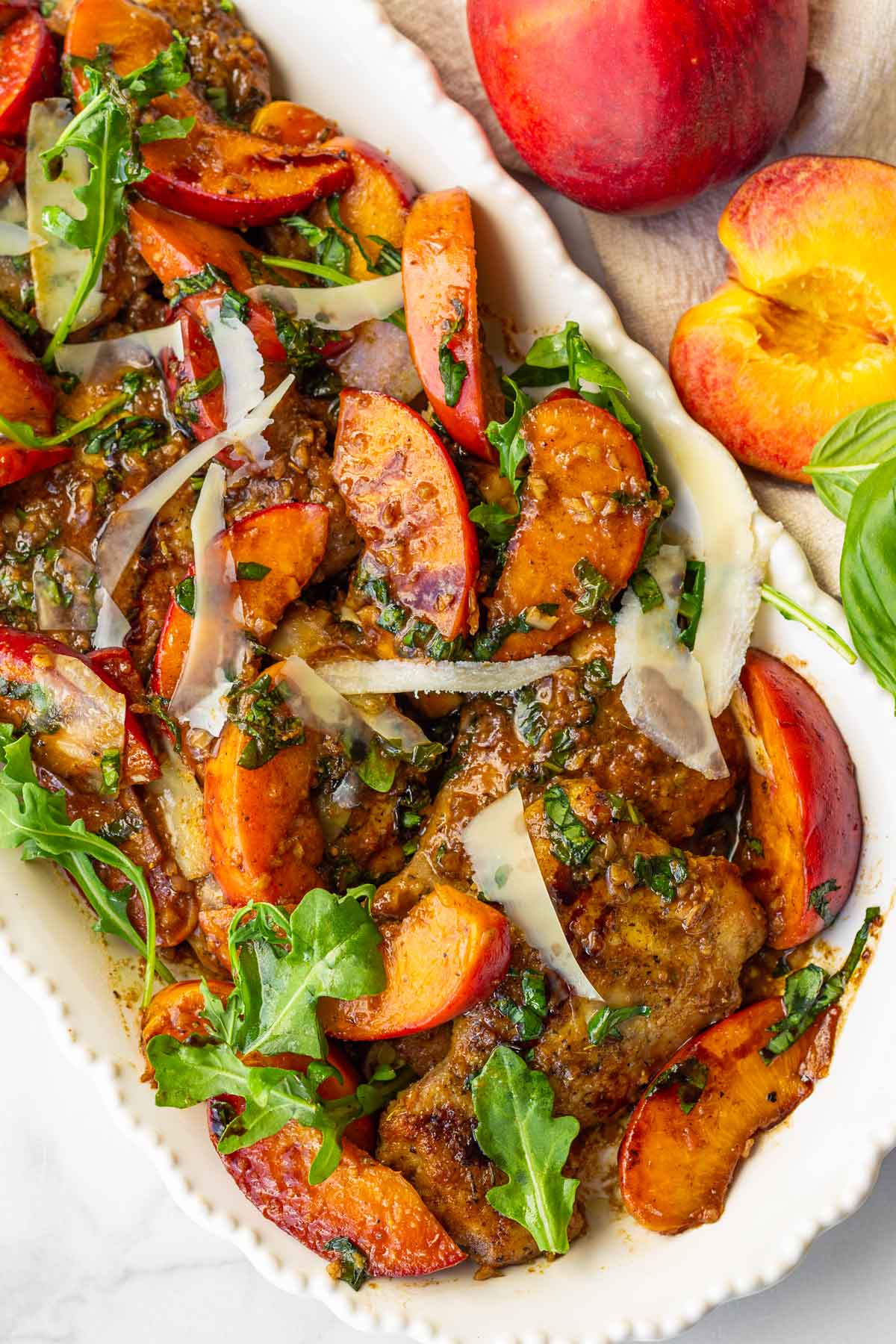 balsamic peaches with chicken served in a long plate