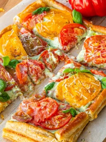 slices of puff pastry tomato tart with ricotta filling