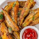 baked roasted potato wedges seasoned with paprika